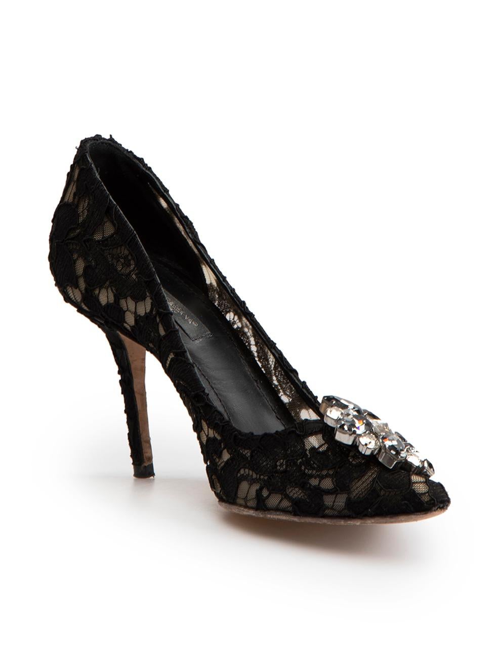 CONDITION is Very good. Minimal wear to shoes is evident. Minimal wear to the heels and toes of both shoes with unravelling of the lace on this used Dolce & Gabbana designer resale item.
 
 Details
 Black
 Lace
 Slip on pumps
 Pointed toe
 High