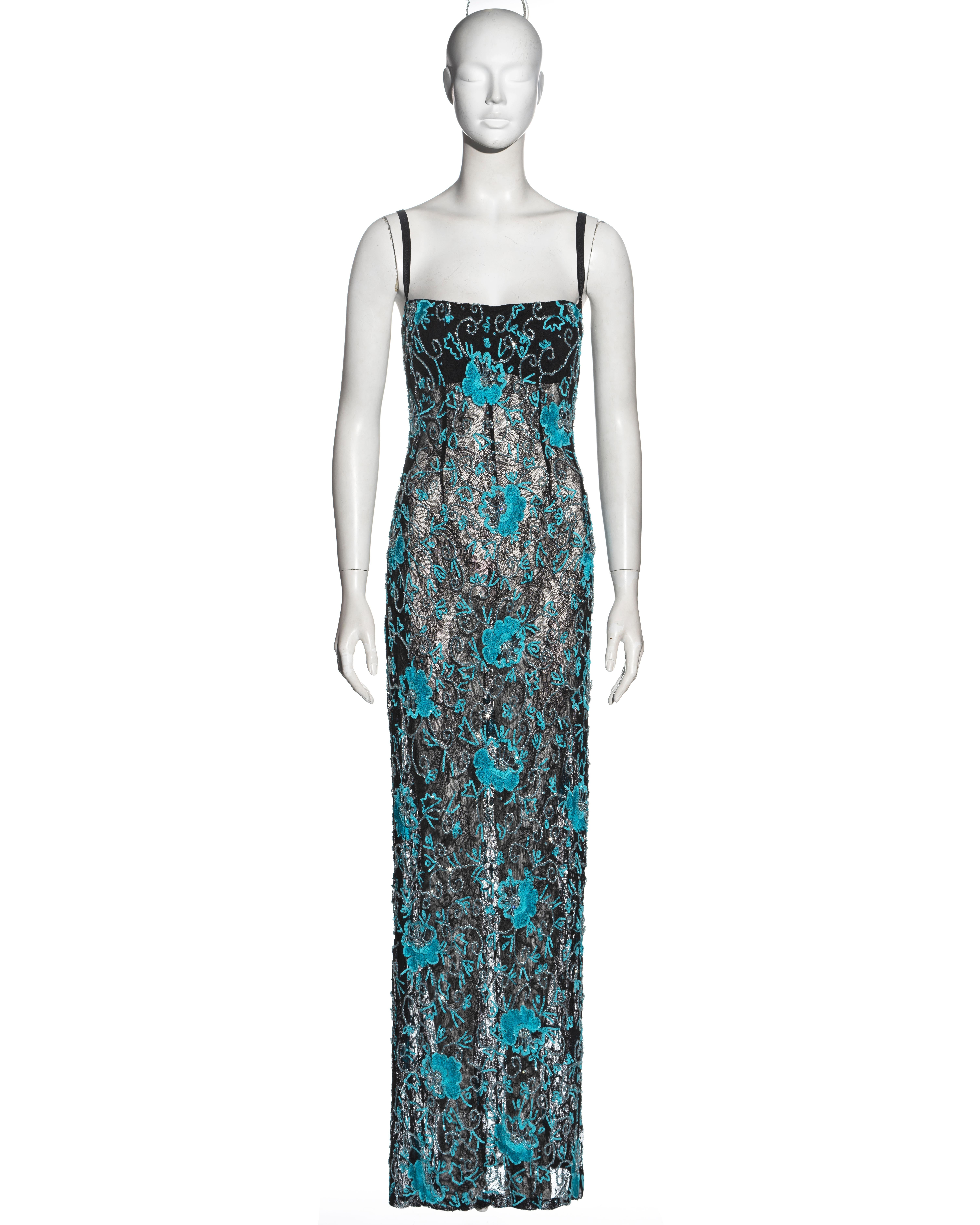 ▪ Dolce & Gabbana black lace evening dress
▪ Turquoise floral embroidery with crystal and sequin embellishments 
▪ Integrated bra with adjustable shoulder straps 
▪ Floor length 
▪ Semi-transparent 
▪ IT 44 - FR 40 - UK 12 - US 8
▪ Fall-Winter