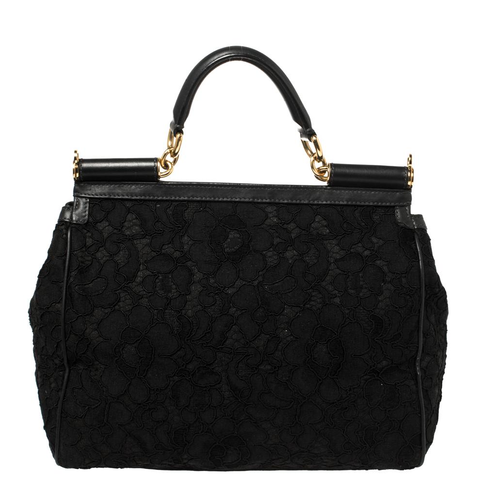 Whether it is a casual evening or a night out with your friends, this Miss Sicily bag is a splendid pick for any occasion. This bag from the house of Dolce & Gabbana is crafted from lace fabric and has a pretty design that comes with a top handle