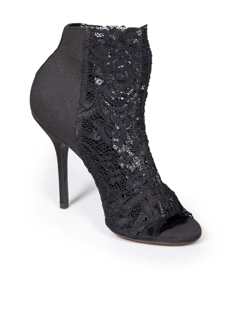 CONDITION is Very good. Minimal wear to heels is evident. Minimal wear to the lace panelling with one or two plucks to the weave found on this used Dolce & Gabbana designer resale item.
 
 Details
 Black
 Lace
 Heels
 Peep toe
 High heeled
 Slip on
