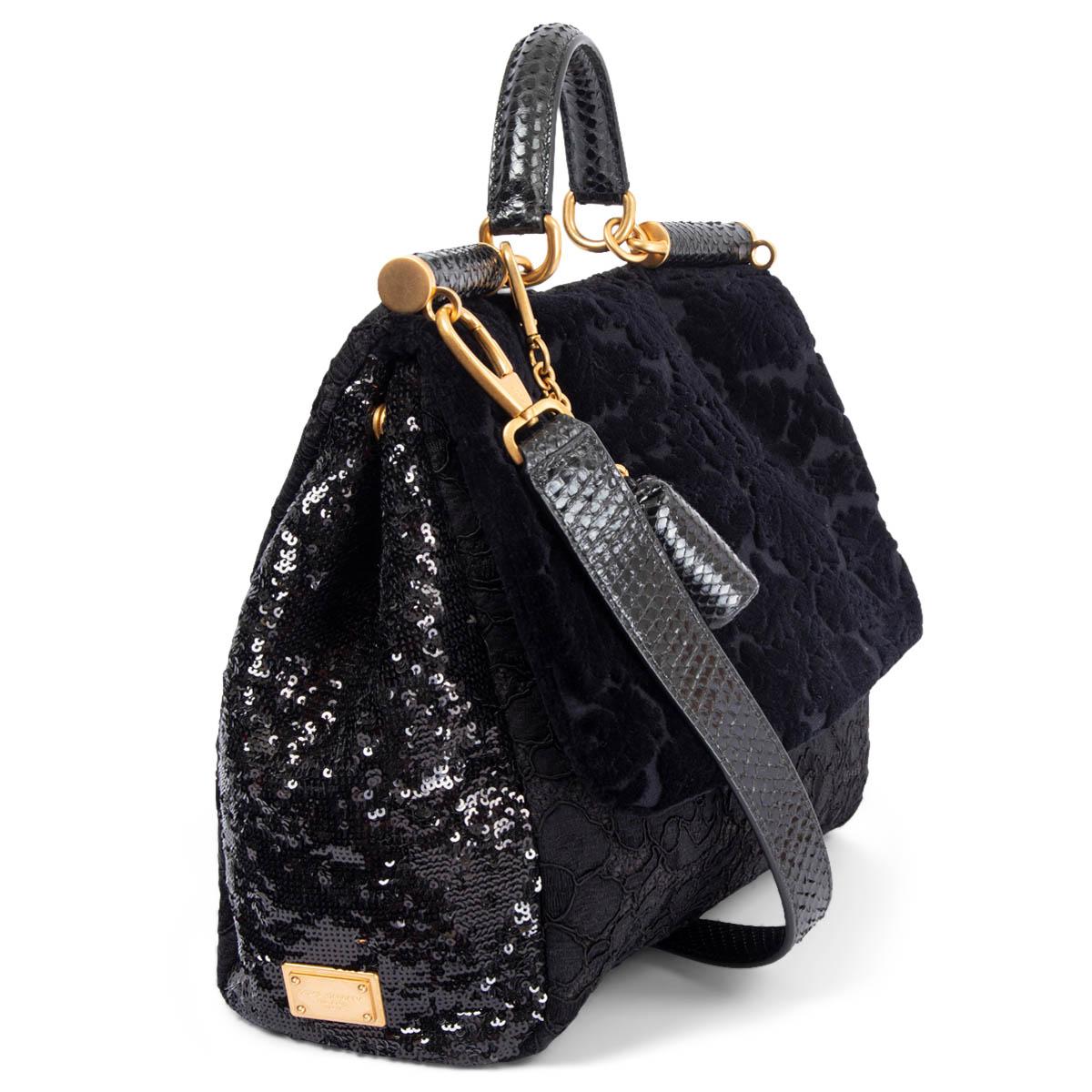 100% authentic Dolce & Gabbana Miss Sicily Large shoulder bag in black lace with devoree velvet flap and sequin gussets featuring gold-tone hardware. Opens with a flap to the signature leopard print canvas lining with one zip pocket against the back