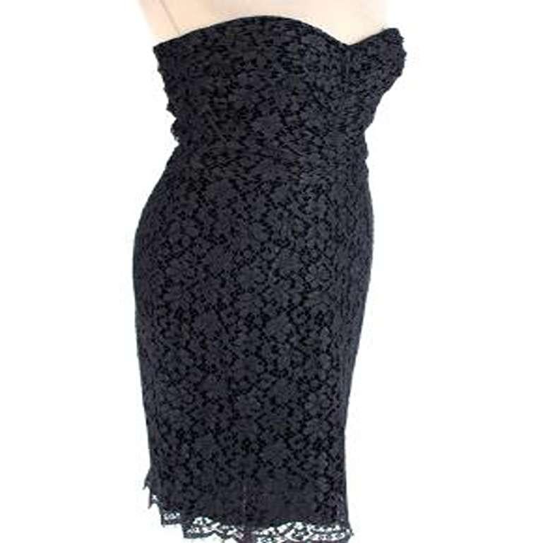 Dolce & Gabbana Black Lace Strapless Mini Dress

- Made of luscious cotton.
- fitted
- Floral applique.
- strapless.

Made in Italy.
Light dry clean.
Condition 9.5/10. Excellent condition

PLEASE NOTE, THESE ITEMS ARE PRE-OWNED AND MAY SHOW SIGNS OF