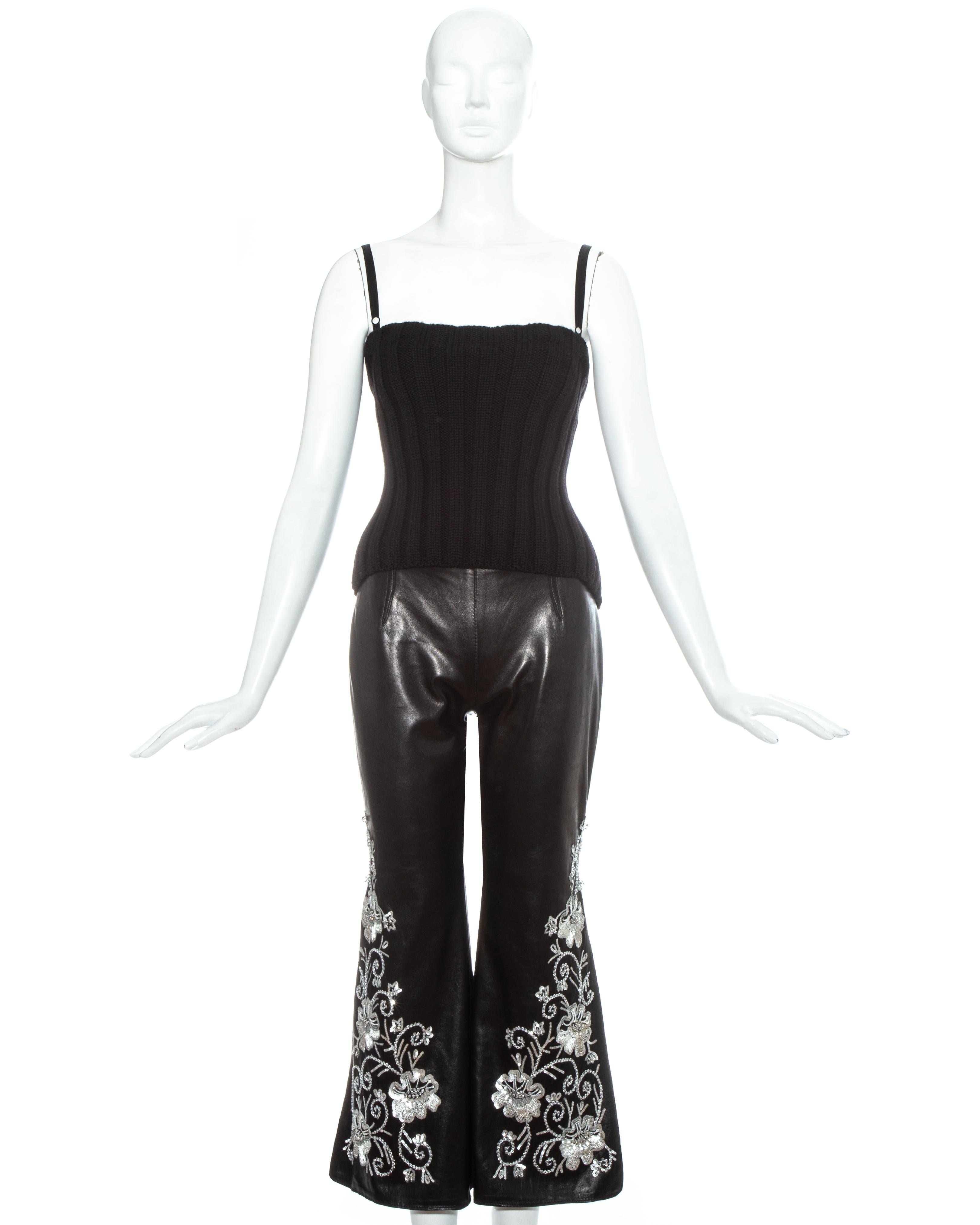 Dolce & Gabbana black leather culottes with silver floral embroidery and black ribbed wool backless corset top with built-in bra

Fall-Winter 1999