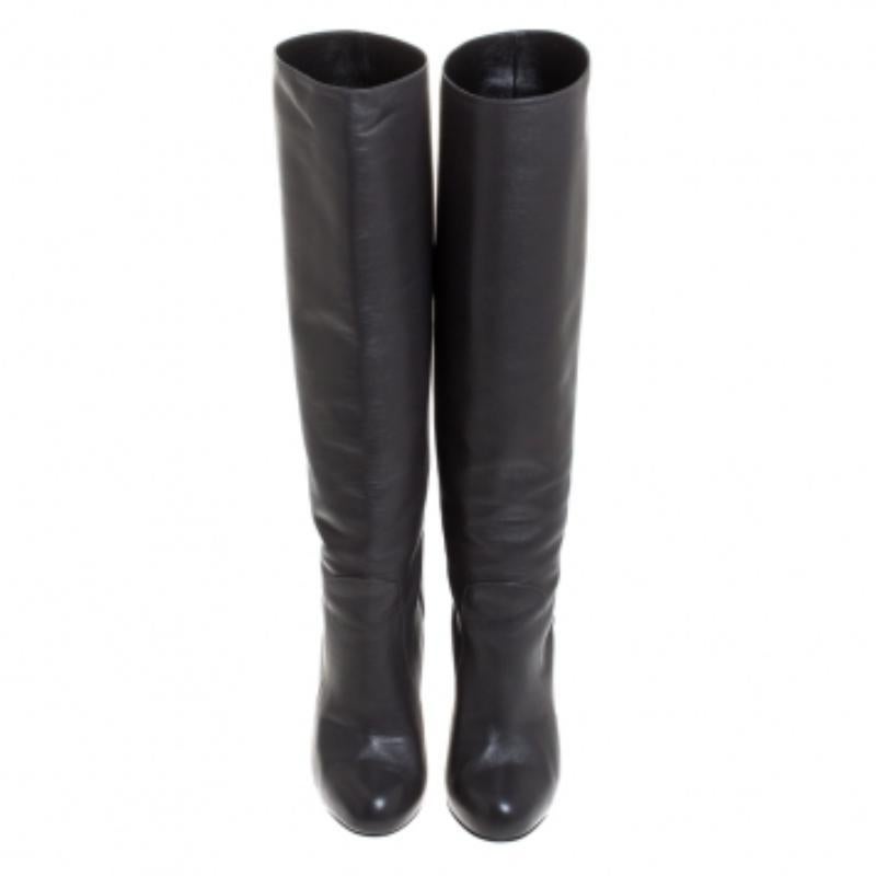 Dolce & Gabbana Schwarze knielange Plateaustiefel aus Leder Größe 36 Damen im Angebot