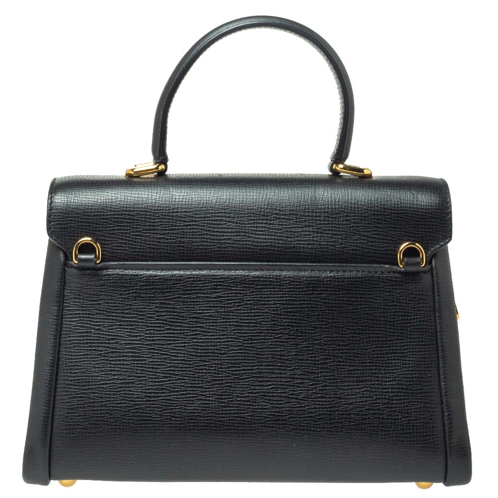 This Dolce & Gabbana Lucia bag is the perfect partner for days when you need a little more than just your little essentials with you. It is designed in a gorgeous leather body and comes fitted with a detachable shoulder strap and a top handle. It is