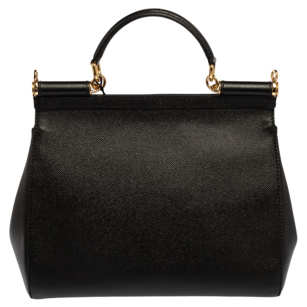 The Miss Sicily bag is one of the most celebrated creations from Dolce & Gabbana. The bag beautifully embodies the spirit of extravagance and feminity that the Italian luxury brand carries. Crafted from leather, this bag has a smart shape and comes