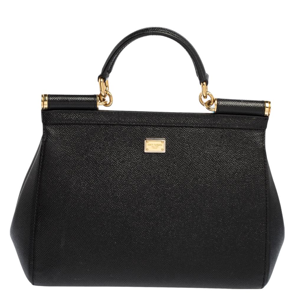 The iconic Miss Sicily bag by Dolce & Gabbana is one of the most loved designs from the brand. The elegant silhouette for this version is made from leather in a black shade and added with eye-catching prints. The creation is complemented with