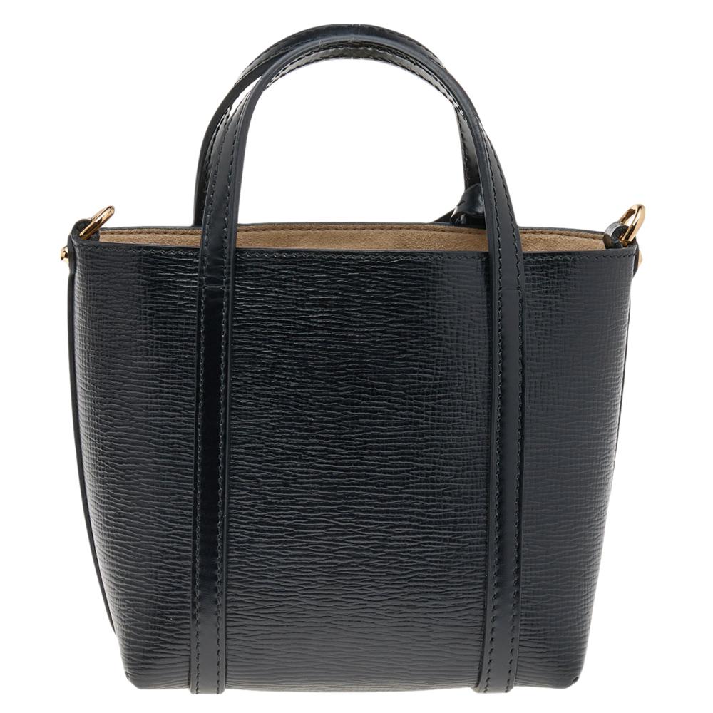 Made from black leather, and an Alcantara-lined interior, this bag can effortlessly be fashioned with both off-duty and formal looks. The excellent craftsmanship of this Dolce & Gabbana piece ensures a fine finish and a rich appeal.

Includes: