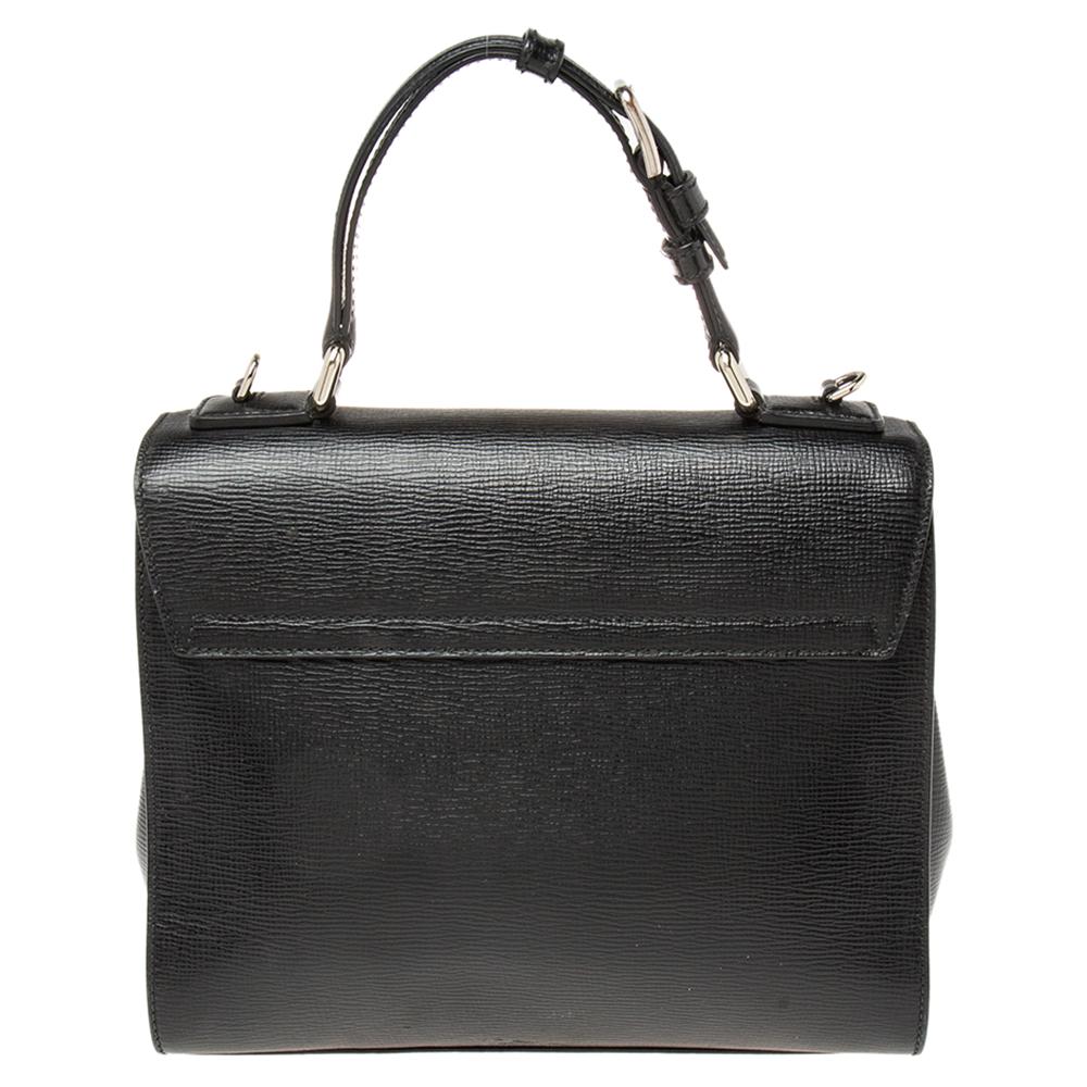 Dolce & Gabbana is all set to impress you with its opulent and classic edition of the Monica bag. Crafted from leather, it features a single top handle along with a detachable and adjustable shoulder strap to keep you hands-free. This bag is