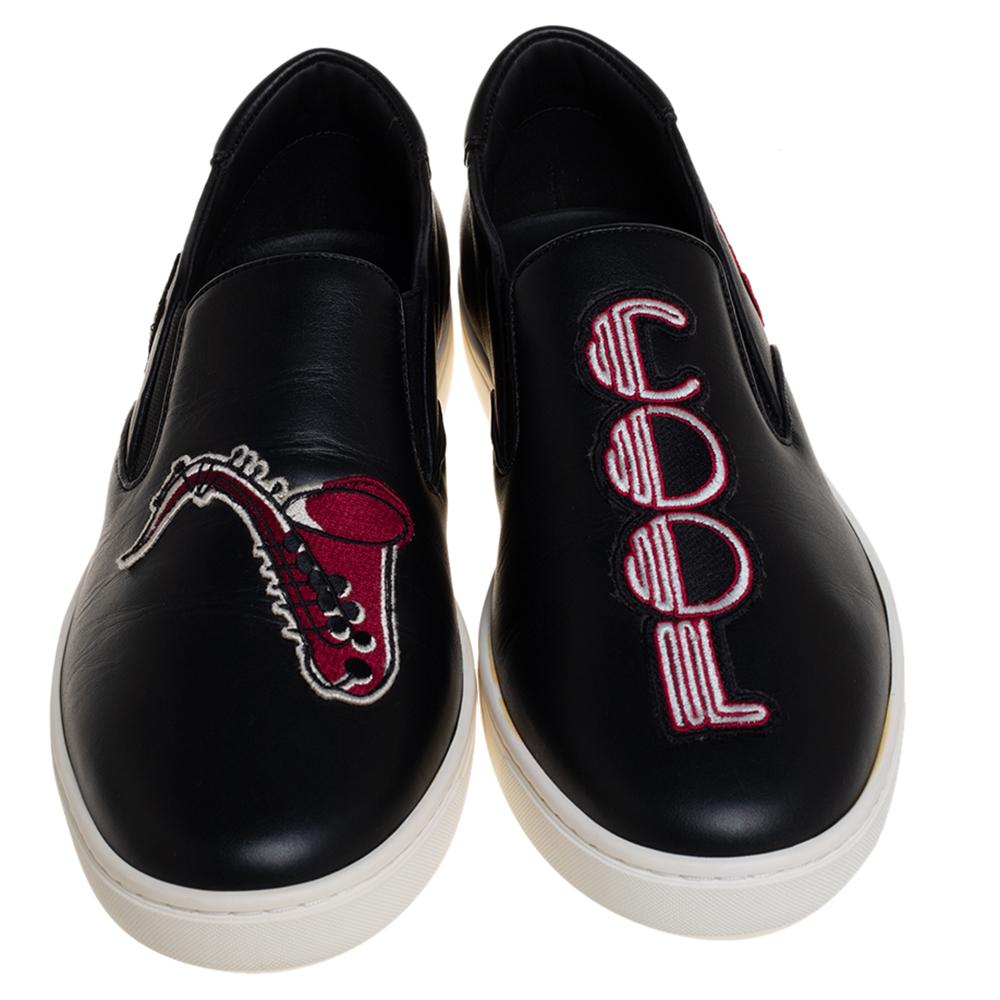 Stand apart from the crowd with these slip-on sneakers from Dolce & Gabbana. The black leather exterior is designed with cool patches. Pair these style sneakers with your favorite athleisure wear, a leather backpack, and sunglasses.

Includes: Price