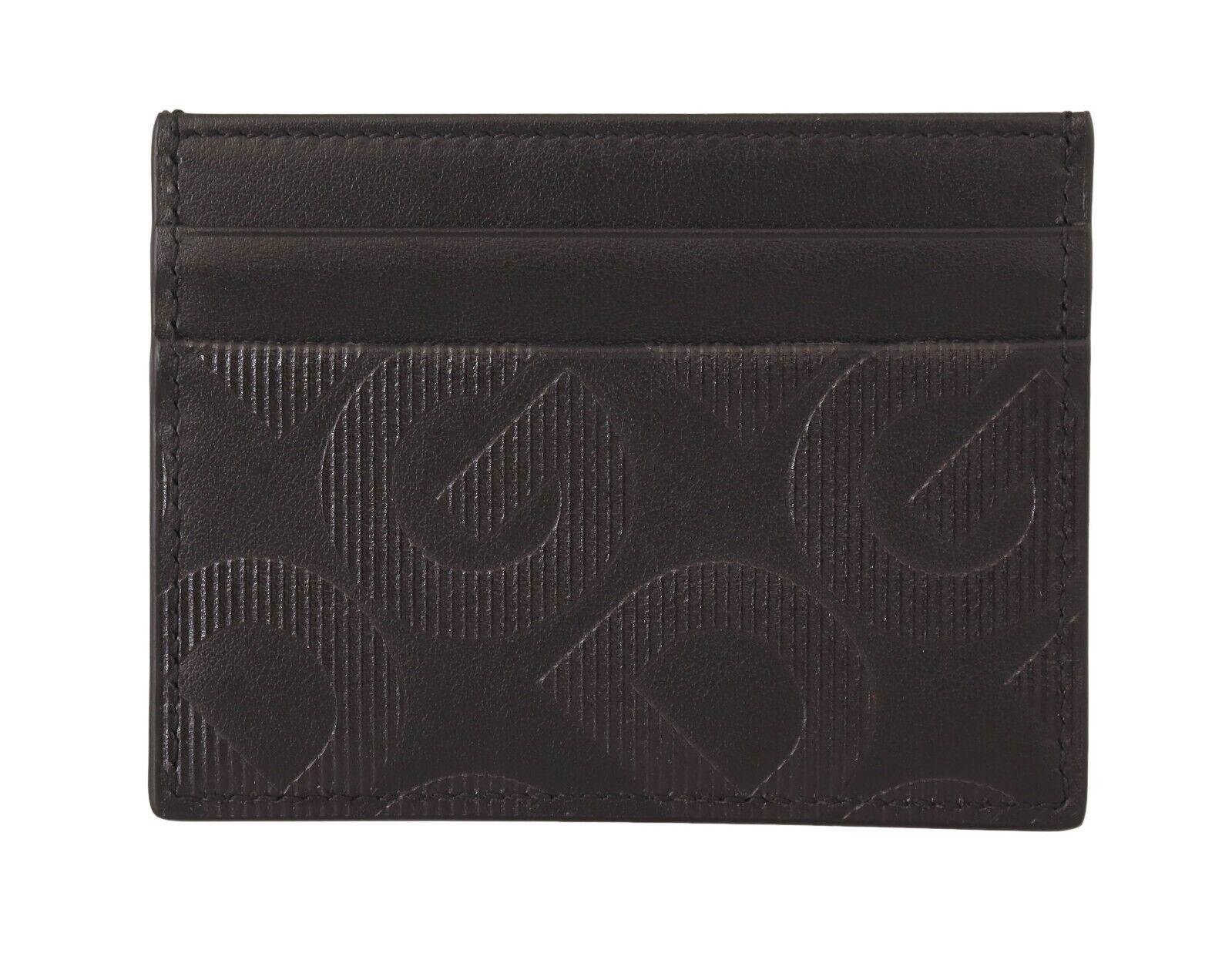 DOLCE & GABBANA

Absolutely stunning, 100% Authentic, brand new with tags Dolce & Gabbana black cardholder was made by the masters of the brand from soft leather, resistant to scratches and creases. The accessory with four slots for plastic cards