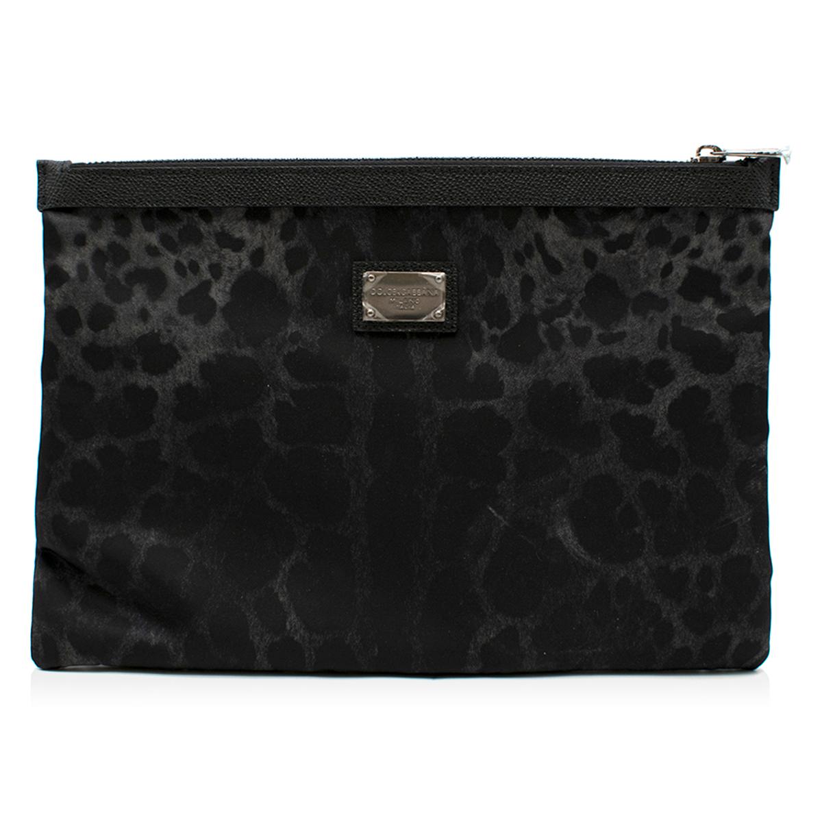 Dolce & Gabbana Black Leopard Print Pouch

- Nylon leopard print pouch 
- Black leather trim
- Silver tone zip fastening

This item comes with the original box and dust bag 

Please note, these items are pre-owned and may show some signs of storage,