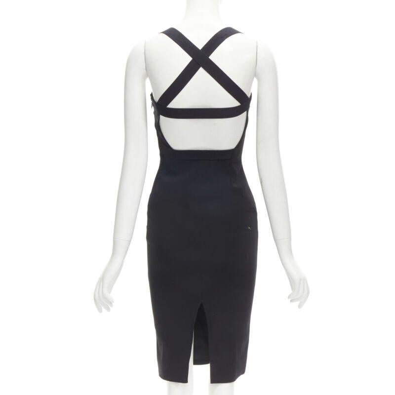 DOLCE GABBANA black logo elastic strap cross back bodycon dress IT36 XS
Reference: CC/FITI00052
Brand: Dolce Gabbana
Designer: Domenico Dolce and Stefano Gabbana
Material: Viscose, Acetate
Color: Black
Pattern: Solid
Closure: Zip
Extra Details: