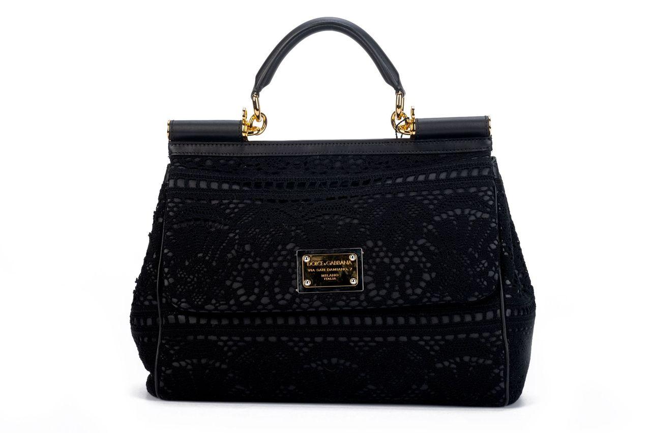 Dolce & Gabbana new large black macrame’ bag with adjustable and detachable strap. Comes with ID card, tag and original dust cover.