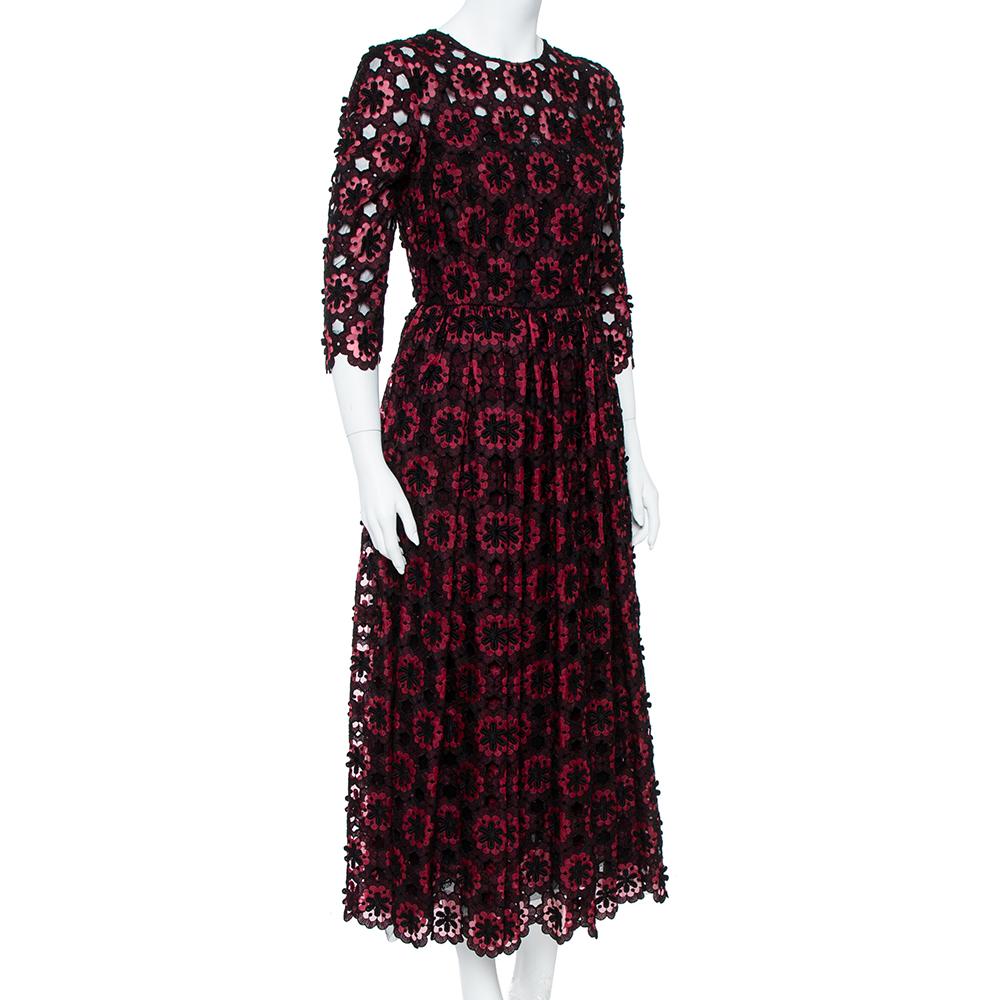 Look like an absolute diva when you wear this stunning midi dress by Dolce & Gabbana. The label's unique appeal of romantic Italian glamour is summed up perfectly by this creation. Made from intricate floral lace – a signature of the Pre-AW15