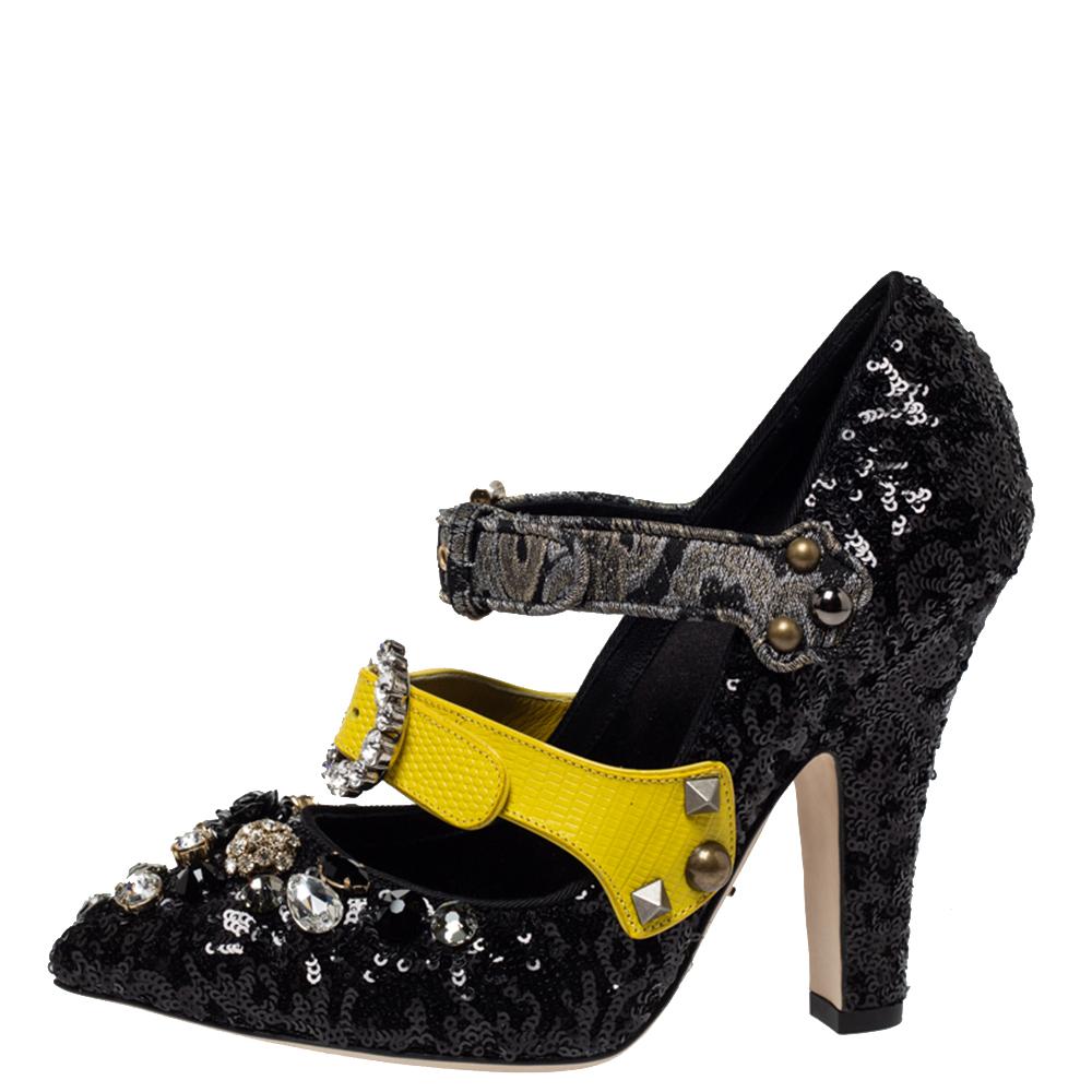 Everything about these Mixed Media pumps from Dolce & Gabbana is charming and impressive. They are covered in black sequins all over and feature a Mary-Jane silhouette with triple straps across the uppers. Further, the pair is enhanced with crystal
