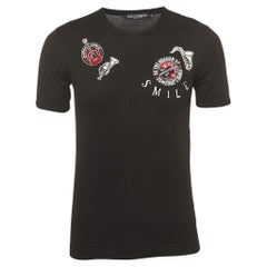 Dolce 
Gabbana Schwarzes halbärmeliges T-Shirt aus bestickter Baumwolle mit Musikstickerei S