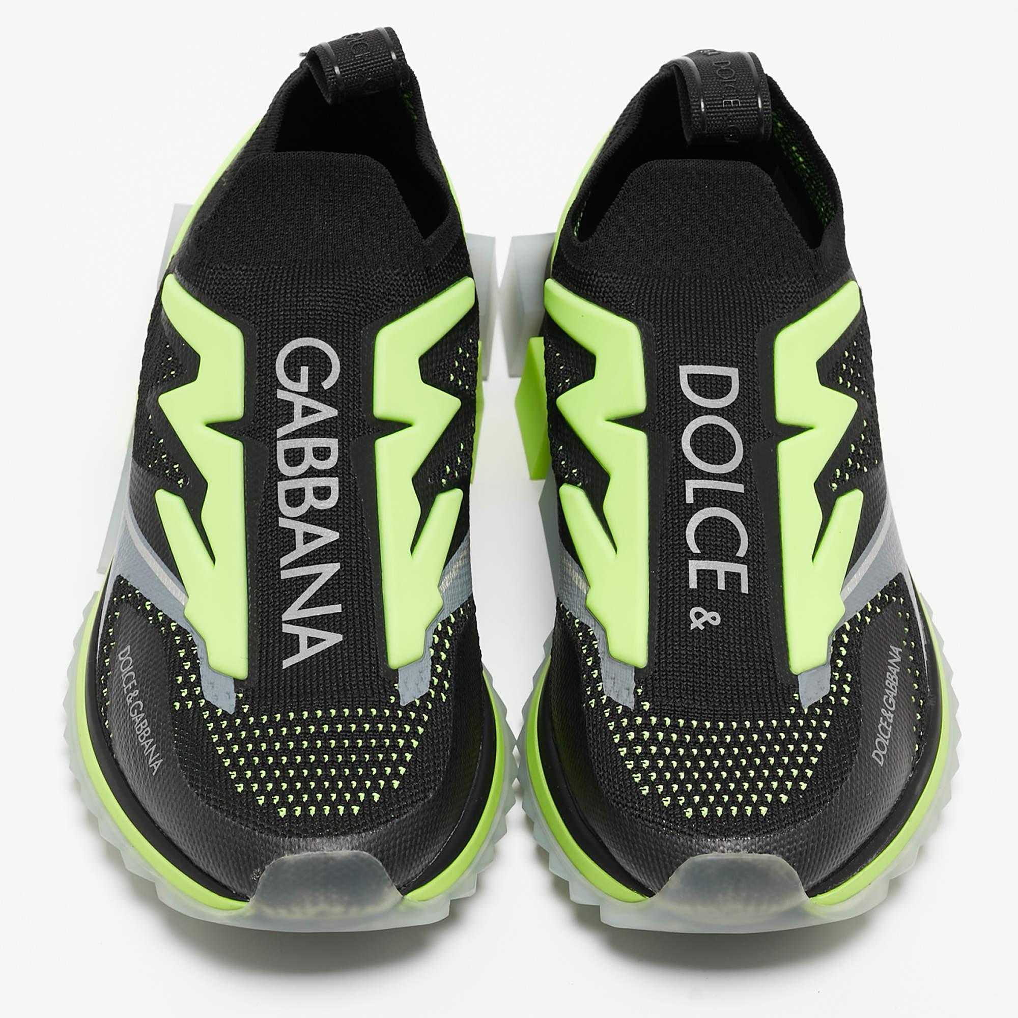 Step into contemporary elegance with Dolce & Gabbana's Sorrento Sneakers. Crafted with precision, these sneakers boast a sleek knit fabric design in a striking black and neon green combination, offering comfort and style in every step with a touch