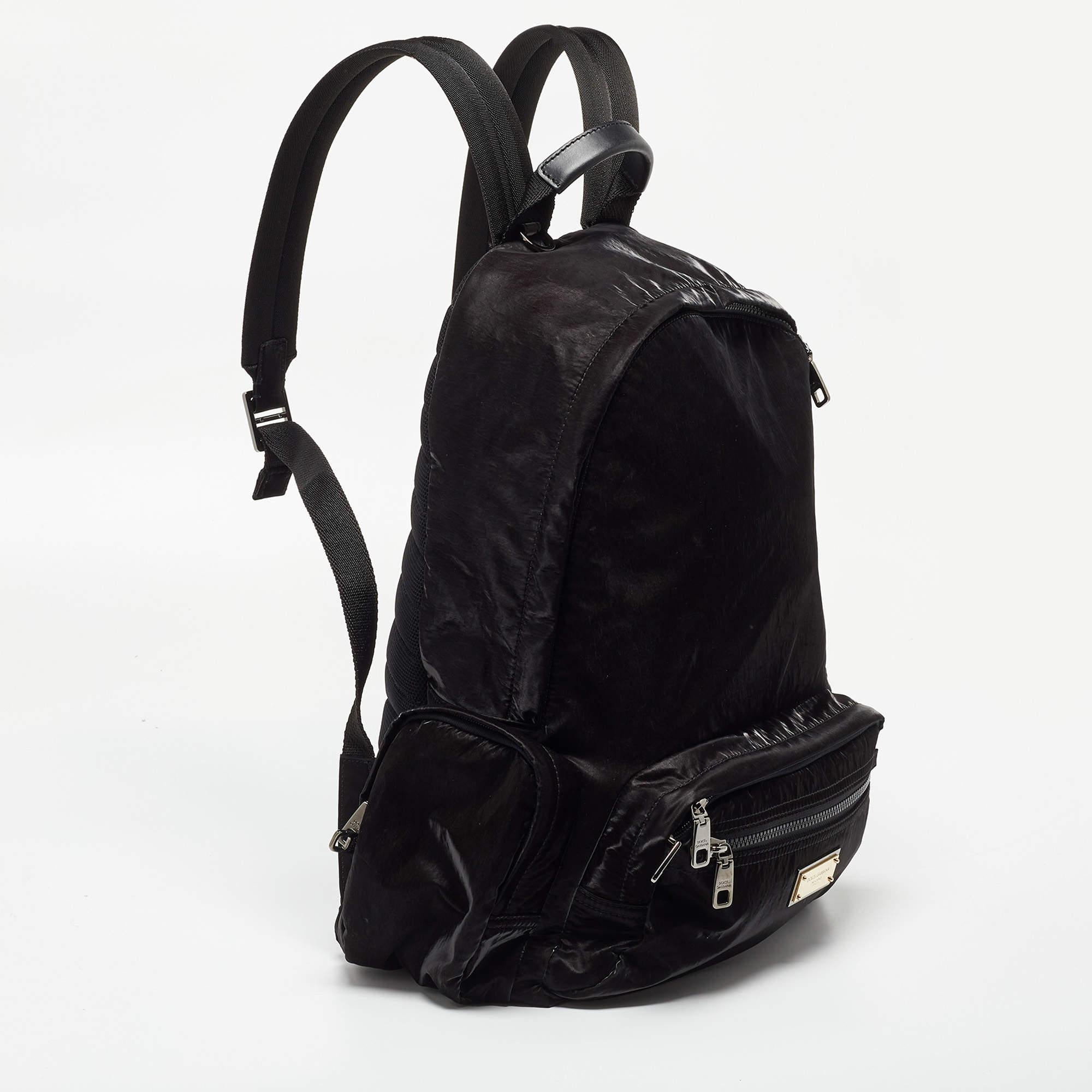 A design of high appeal, this backpack by Dolce & Gabbana will come in handy for daily use or on your travels. It is crafted from nylon and has a spacious interior. Two shoulder straps and a small top handle make it ready to be yours.

