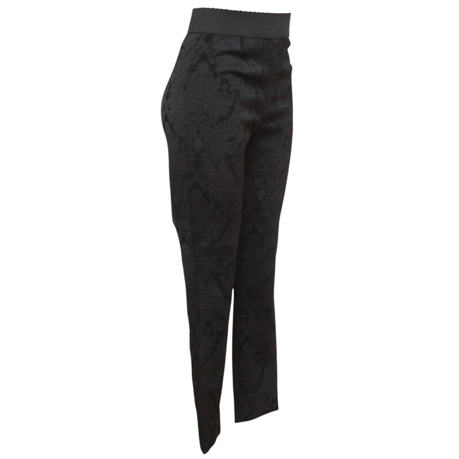 GUARANTEED AUTHENTIC DOLCE & GABBANA BLACK BROCADE SKINNY PANTS

Details:
• Classic black floral brocade print.
• Elastic waist.
• High rise.
• Concealed side zipper and hook.
• Easy to wear year round.

Fabric: 57% Polyester, 24% Acetate, 17%