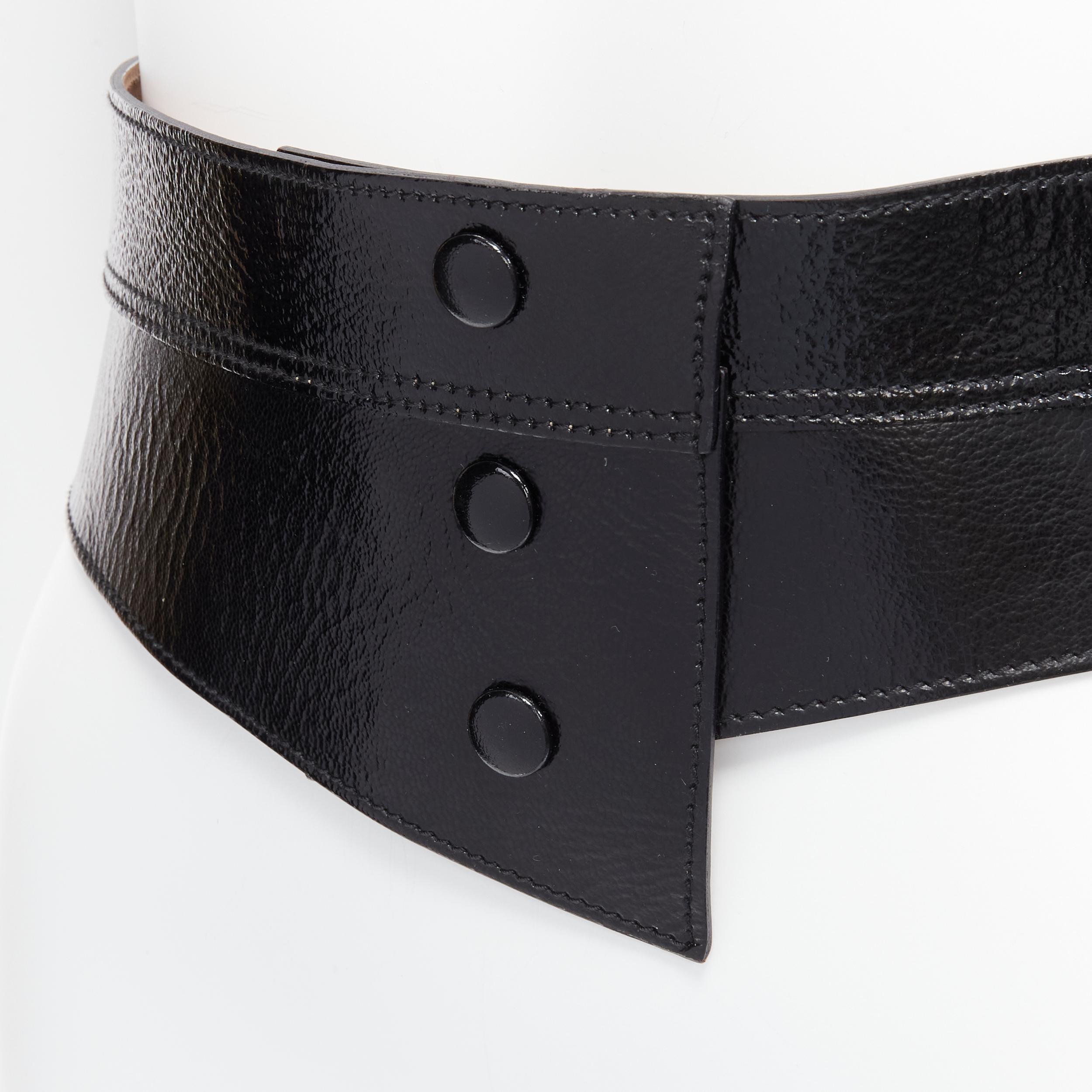 DOLCE GABBANA black patent leather panelled corset obi waist belt 75cm
Reference: AAWC/A00502
Brand: Dolce Gabbana
Designer: Domenico Dolce and Stefano Gabbana
Material: Patent Leather
Color: Black
Pattern: Solid
Closure: Snap Buttons
Lining: Nude