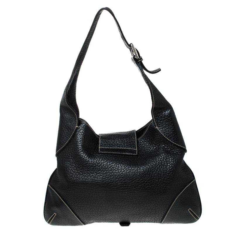 Dolce & Gabbana brings us this functional shoulder bag that has been crafted from pebbled leather and designed with a fabric interior for your belongings. The bag is complete with a single strap and a metal ring on the flap.

Includes: The Luxury