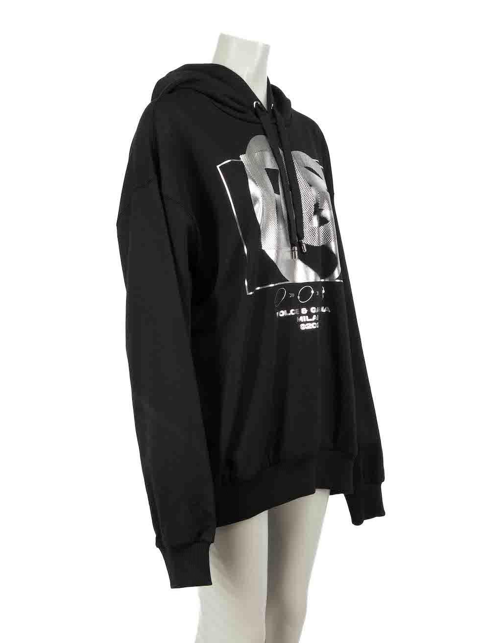 CONDITION is Never worn, with tags. No visible wear to sweatshirt is evident on this new Dolce & Gabbana designer resale item.
 
Details
Unisex
Black
Cotton
Long sleeves hoodie
Oversized fit
Platinum drip graphic print
Hooded with drawstring

Made