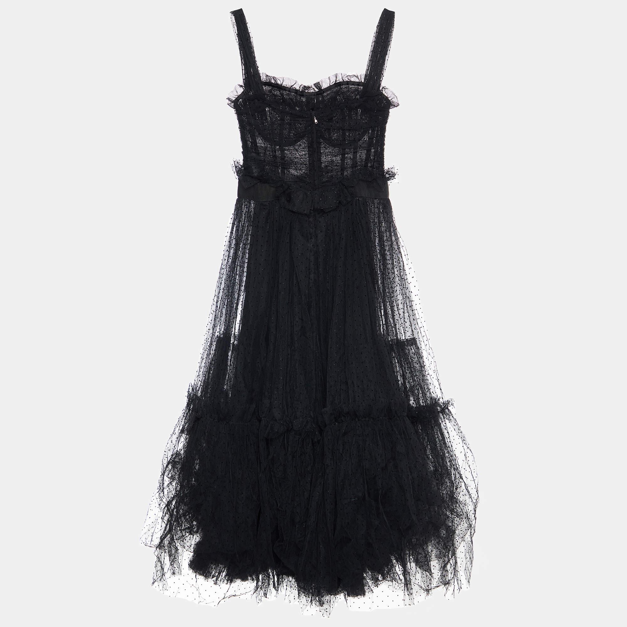 Exhibit a stylish look by wearing this beautiful designer dress. Tailored using fine fabric, this dress has a chic silhouette for a framing fit. Style the creation with chic accessories and pumps.

Includes: Original Dustbag, Original Hanger

