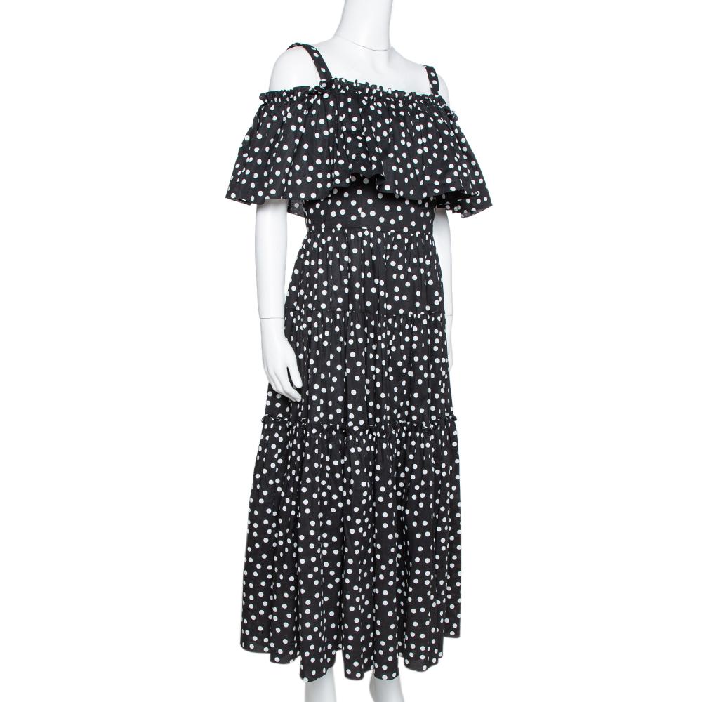 An elegant and urbane piece like this Dolce & Gabbana maxi dress deserves a special place in your wardrobe. A pretty number like this black piece requires minimal efforts to look like a million bucks. Womanly and stylish, this comfortable dress