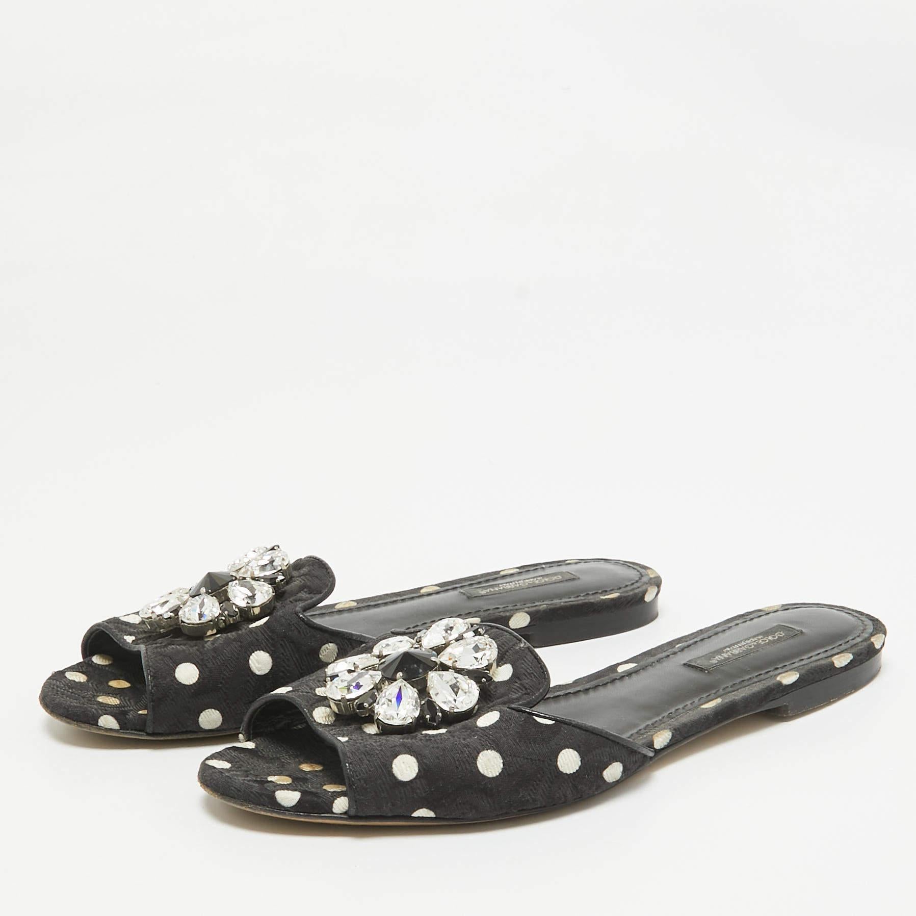Wear these slides on days when you cannot choose between fashion and comfort for they bring both. They are from Dolce and Gabbana designed with crystals on the polka dot exterior.