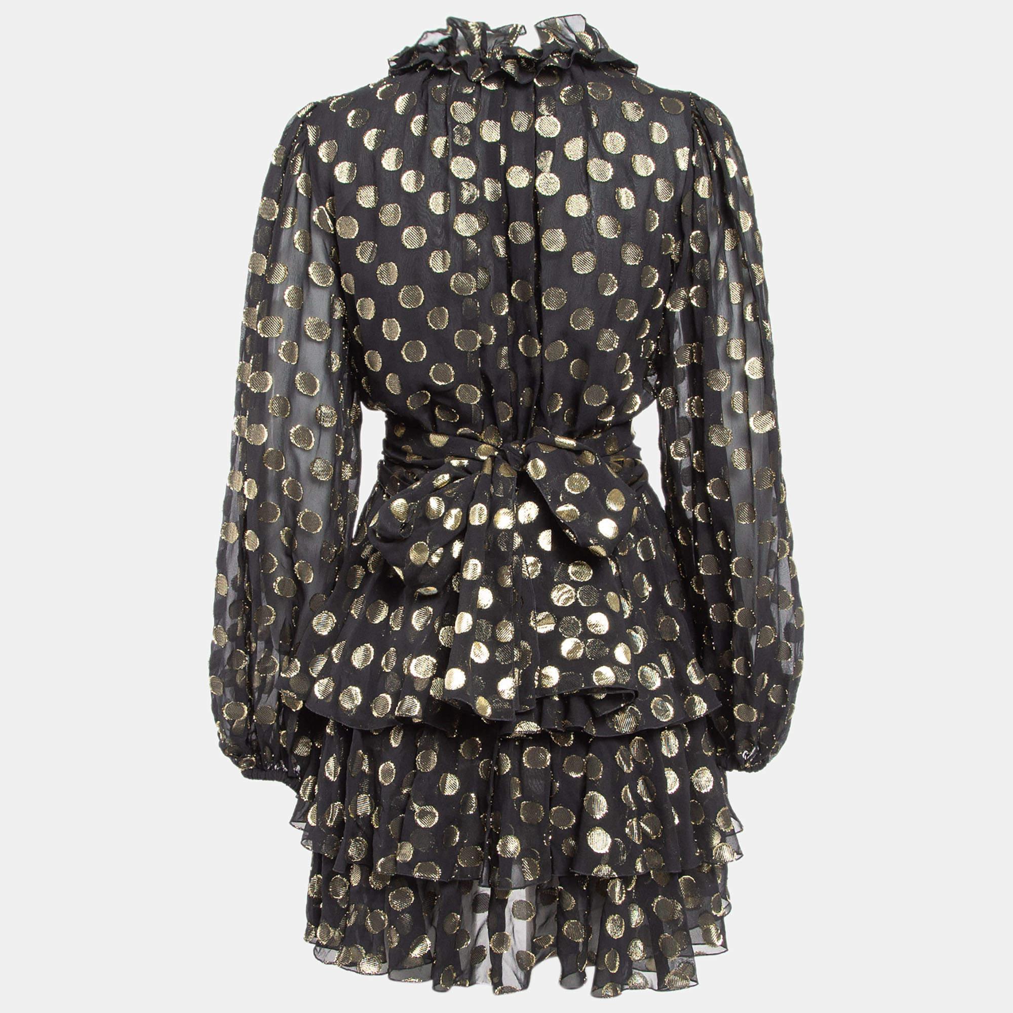 This designer dress is a chic and stylish garment that exudes elegance and sophistication. With its sleek design flattering silhouette and high quality craftsmanship this dress is perfect for any special occasion or evening event ensuring you stand