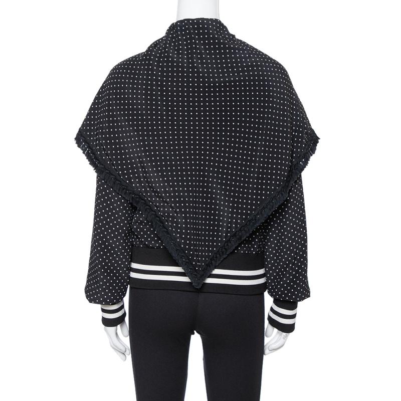 Upgrade your jacket collection with this Dolce & Gabbana piece. This durable piece features striped trims, a cape detail, front zip closure, and polka dots all over. Add more style to your wardrobe with this casual creation.

Includes: Price Tag