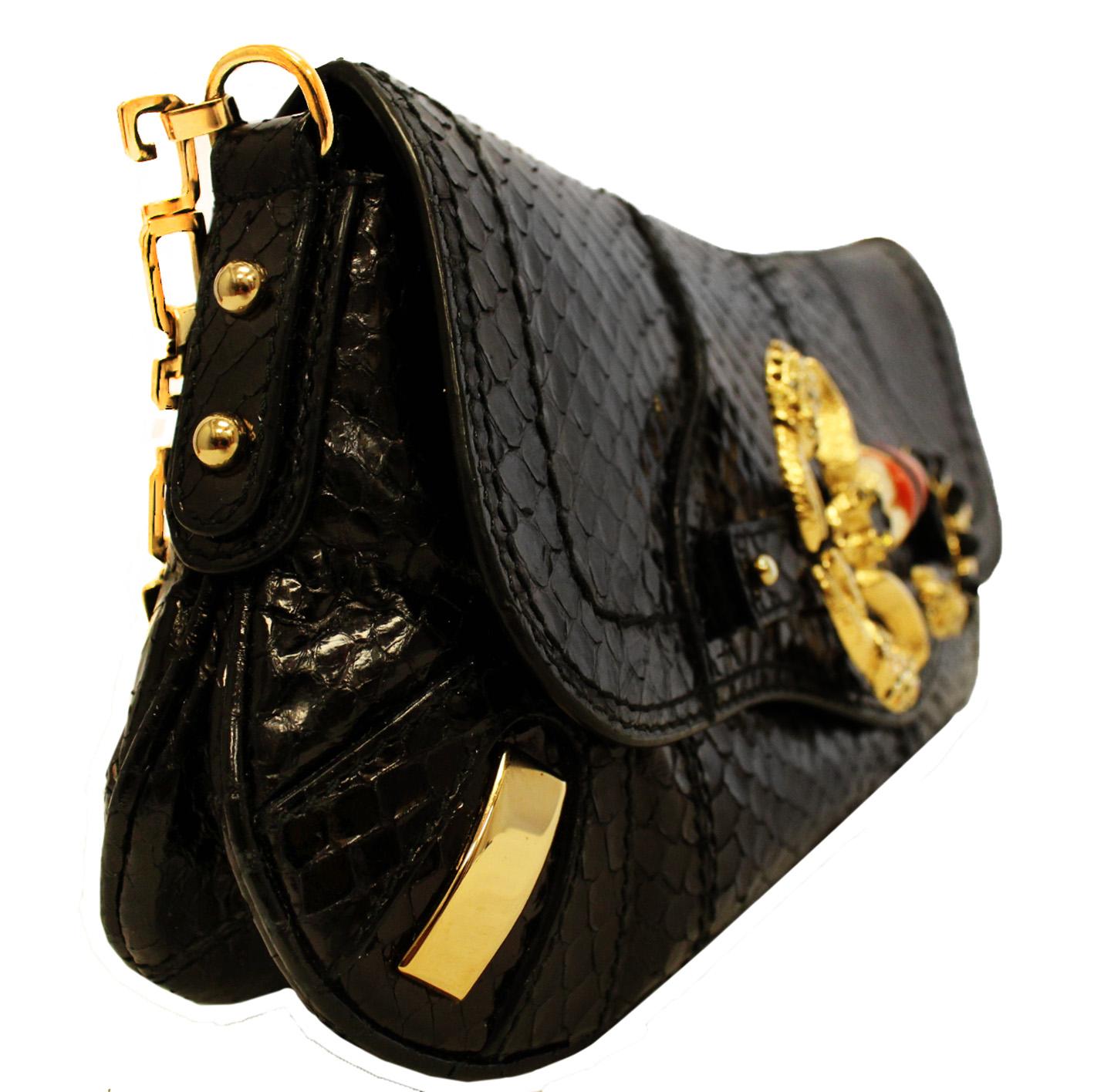 Dolce & Gabbana black python bag decorated with beads scorpion brooch on flap.  This bag is part of the Zodiac Collection created by Dolce & Gabbana, with all the zodiac signs, this Scorpio bag is a rare find.   With a chain link shoulder strap that