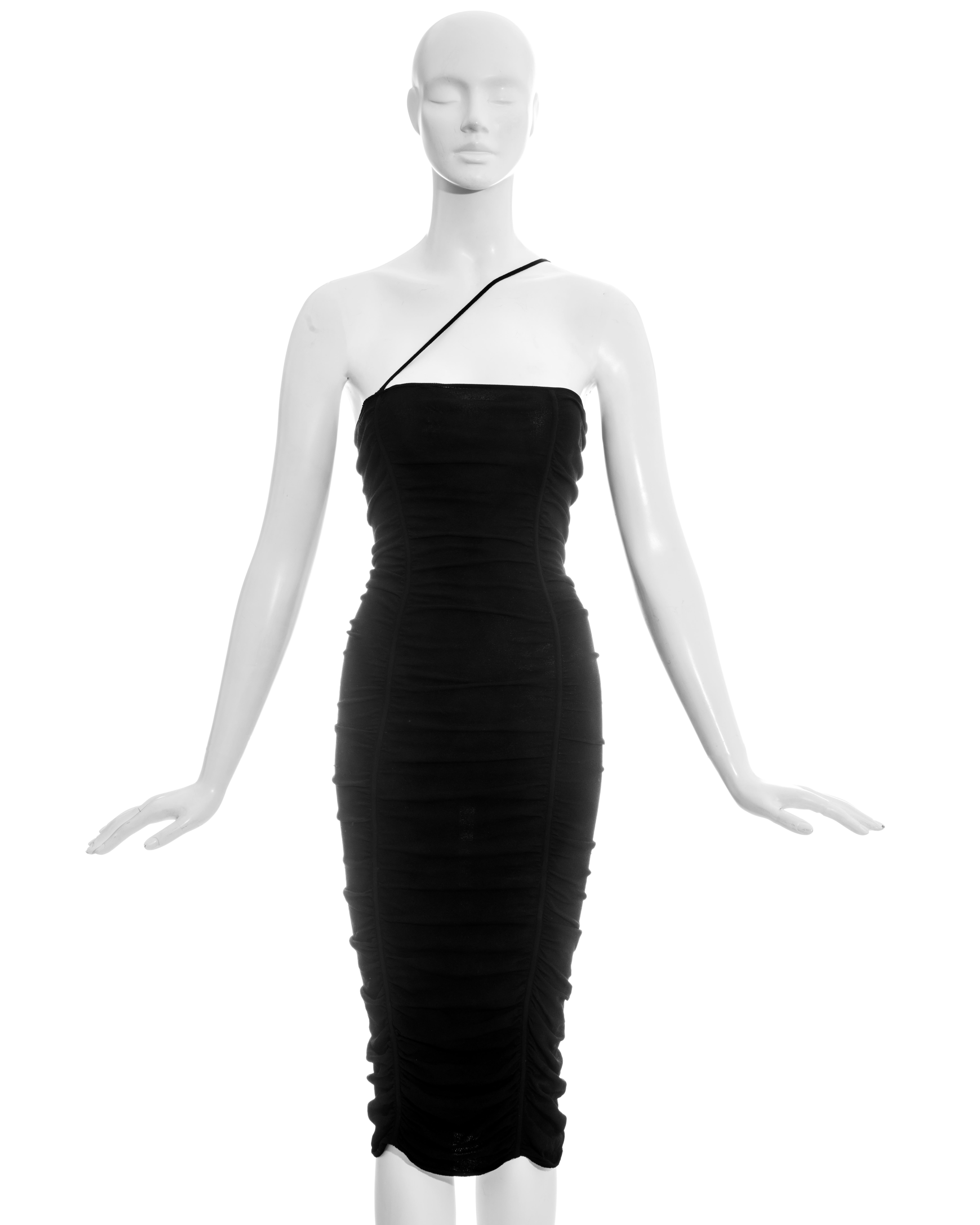 Dolce & Gabbana black rayon ruched figure hugging evening dress with one diagonal spaghetti shoulder strap. Fabric is stretchy. 

Spring-Summer 2001