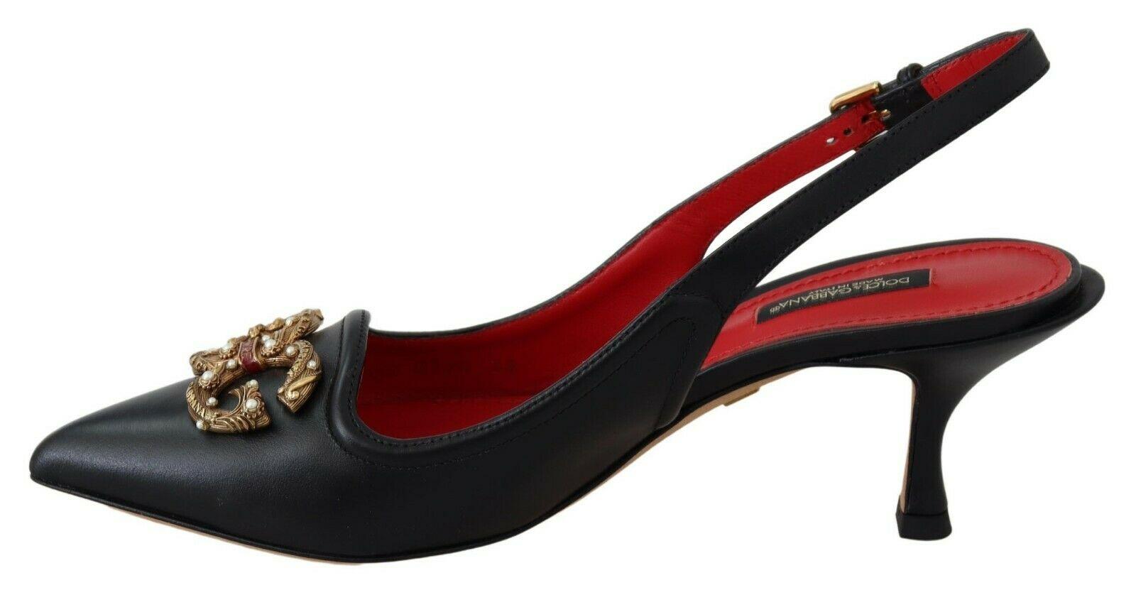 Gorgeous brand new with tags, 100% Authentic Dolce & Gabbana Black ‘Slingback’ pumps with a cut-out detail. Made of leather. Decorated with a buckle strap. Decorated with a metal logo appliqué in gold-tone, cream and red. Beige leather