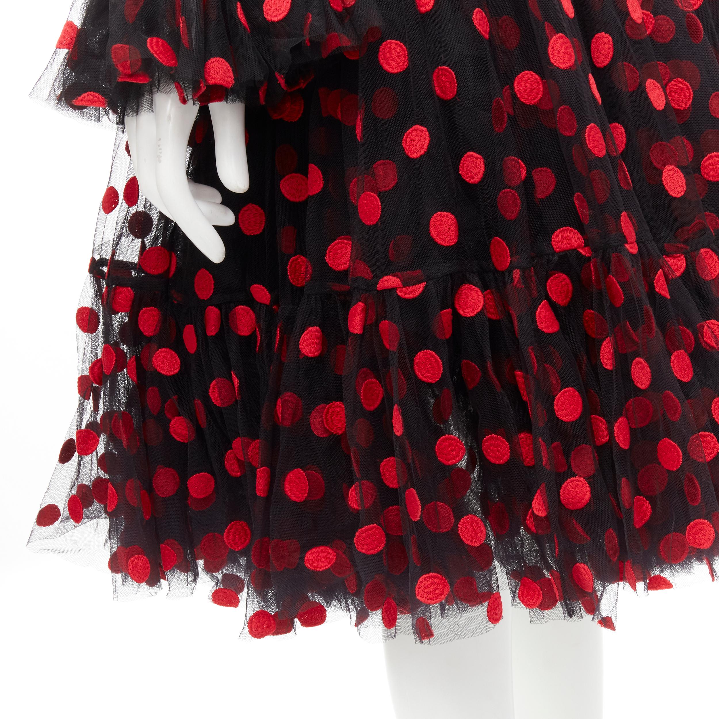 DOLCE GABBANA black red polka dot embroidered tulle flared dress IT40 S 
Reference: KEDG/A00058 
Brand: Dolce Gabbana 
Material: Tulle 
Color: Black 
Pattern: Polka Dot 
Closure: Zip 
Extra Detail: Comes with lace trimmed silk camisole. Flared cuff.