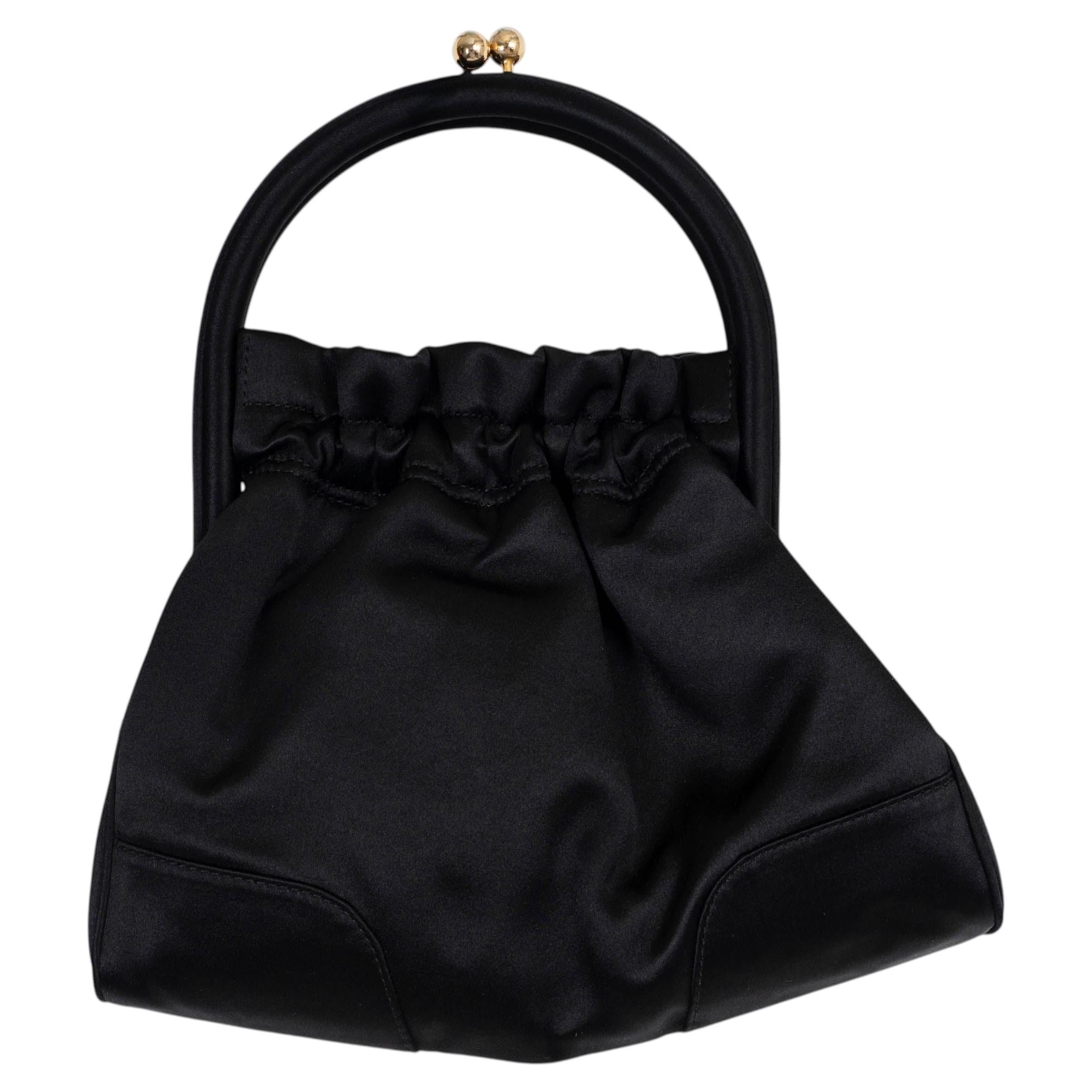 What lining does Dolce & Gabbana use in handbags?