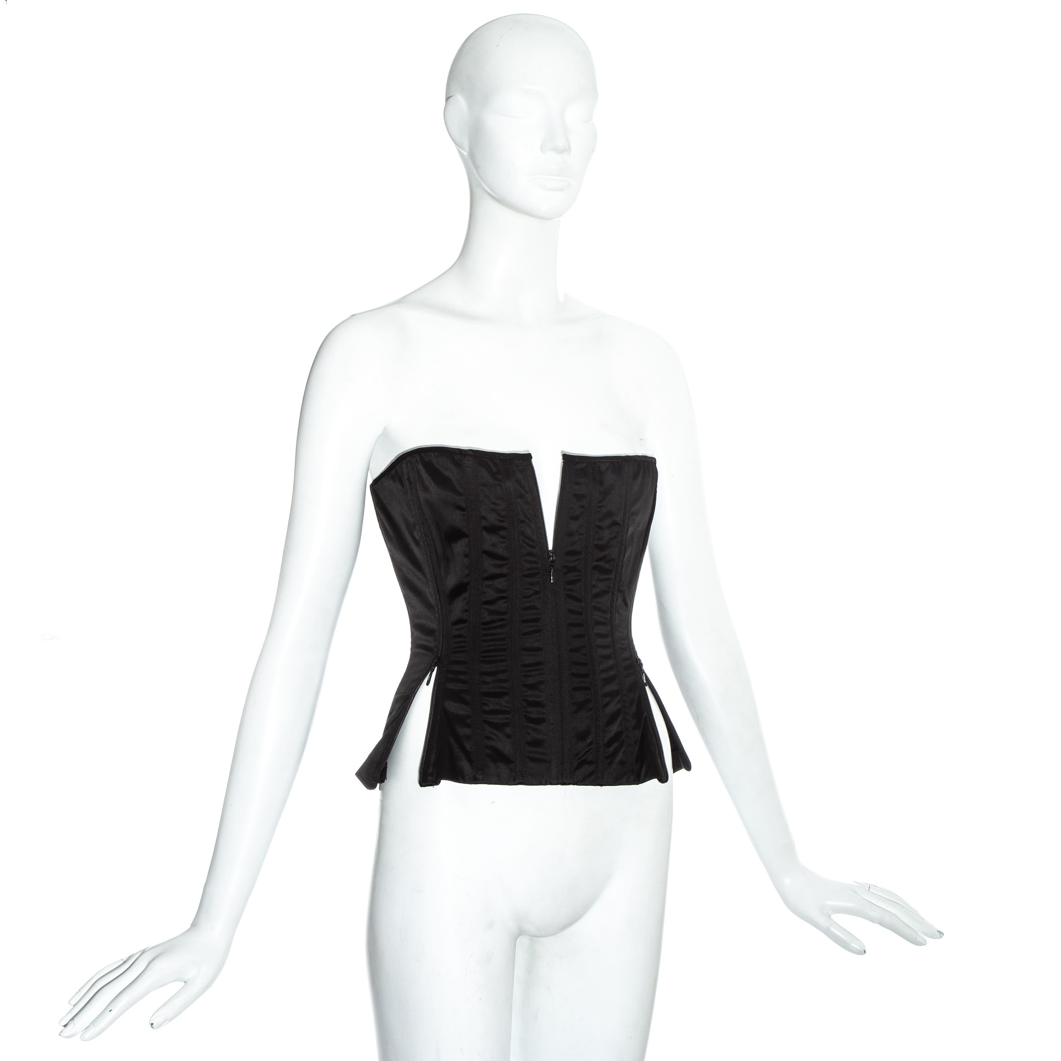 Dolce & Gabbana black satin lycra evening strapless corset with multiple zip fastenings allowing the wearer to style the corset in multiple ways. 

Spring-Summer 1999