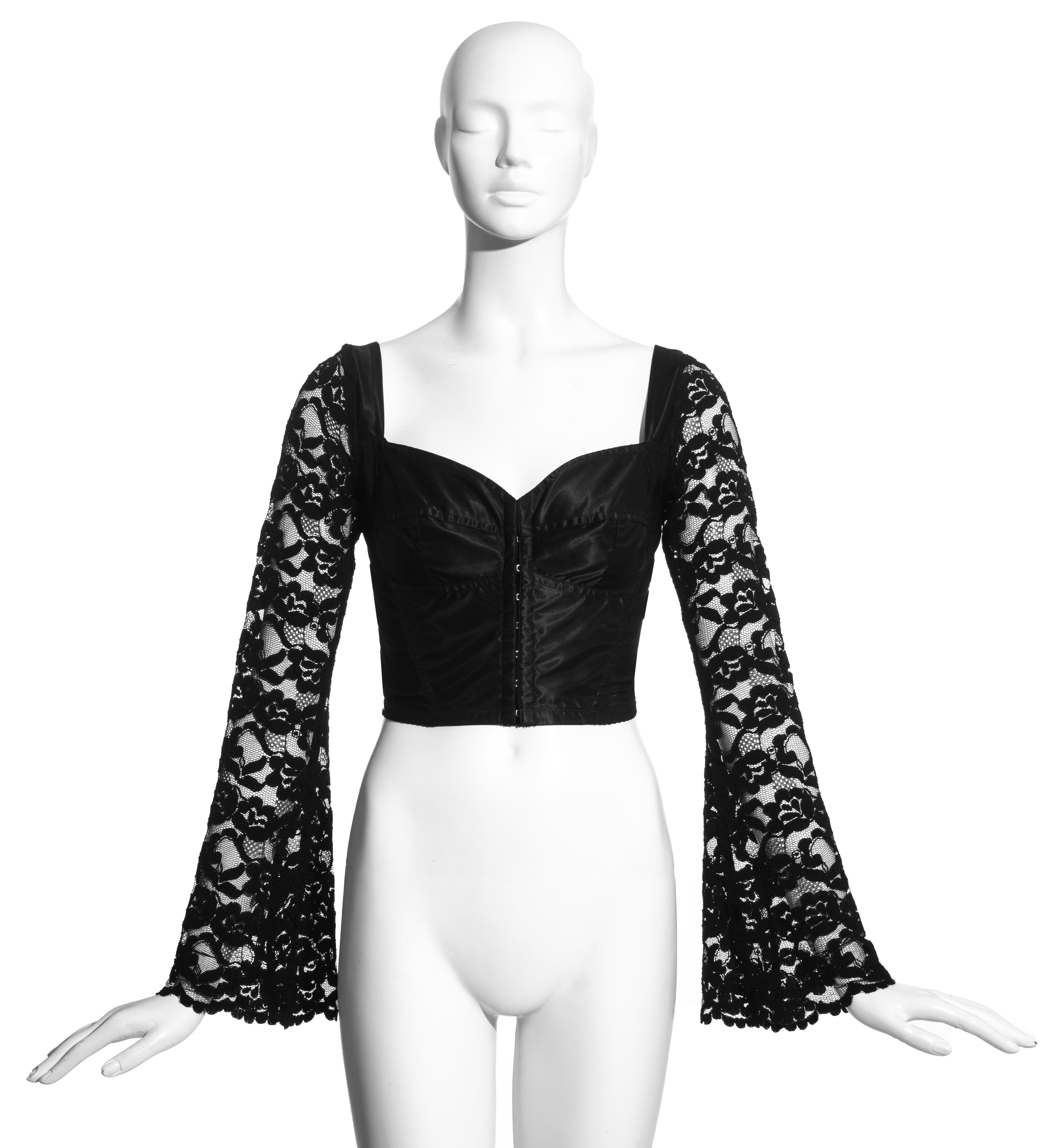 Dolce & Gabbana black satin spandex corset with lace bell sleeves.

Spring-Summer 1993