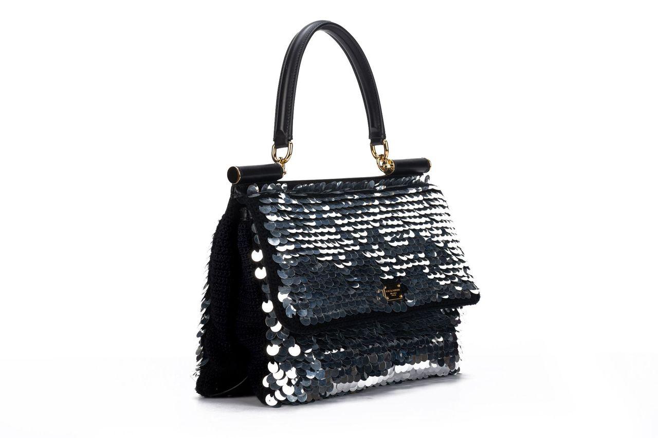 DOLCE & GABBANA new large black and silver sequins handbag, adjustable and detachable strap. Comes with ID card, booklet and original dust cover.
