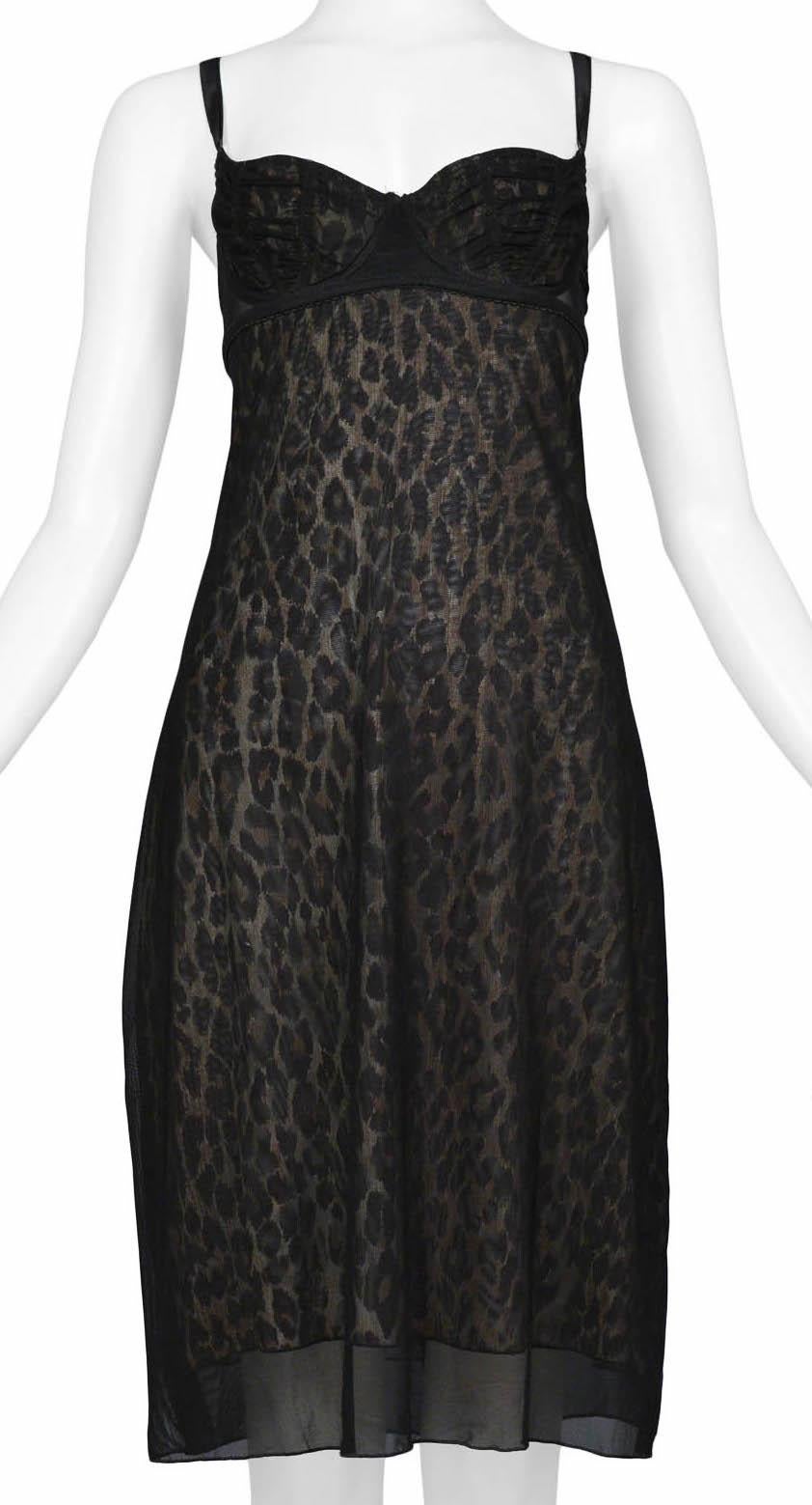 Resurrection Vintage is excited to offer a vintage Dolce & Gabbana black sheer dress featuring a leopard print underlay, inset bustier bra, sheering on the cups, and adjustable straps.

Dolce & Gabbana
Size: 42
75% Polyamide 25% Elastine
Excellent