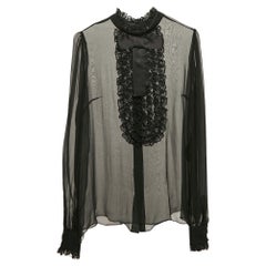 Dolce 
Gabbana - Top nero in pizzo di seta trasparente con bottoni sul davanti - M. I.