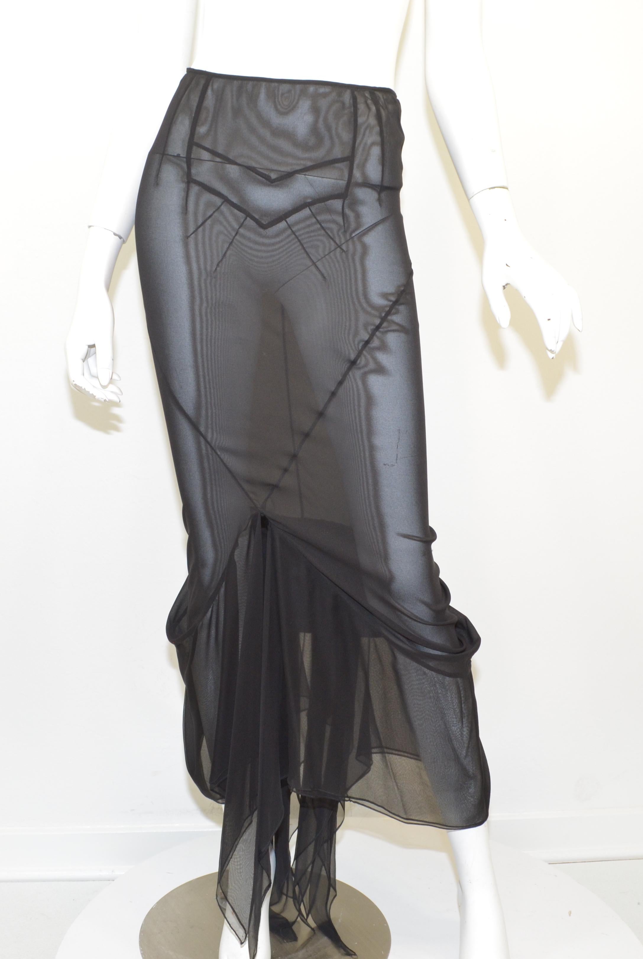 Dolce & Gabbana sheer black silk Chiffon maxi with uneven hem. Back zipper, bias cut to conform to the body. French seams at style lines. Gorgeous on. Made in Italy

Waist 26