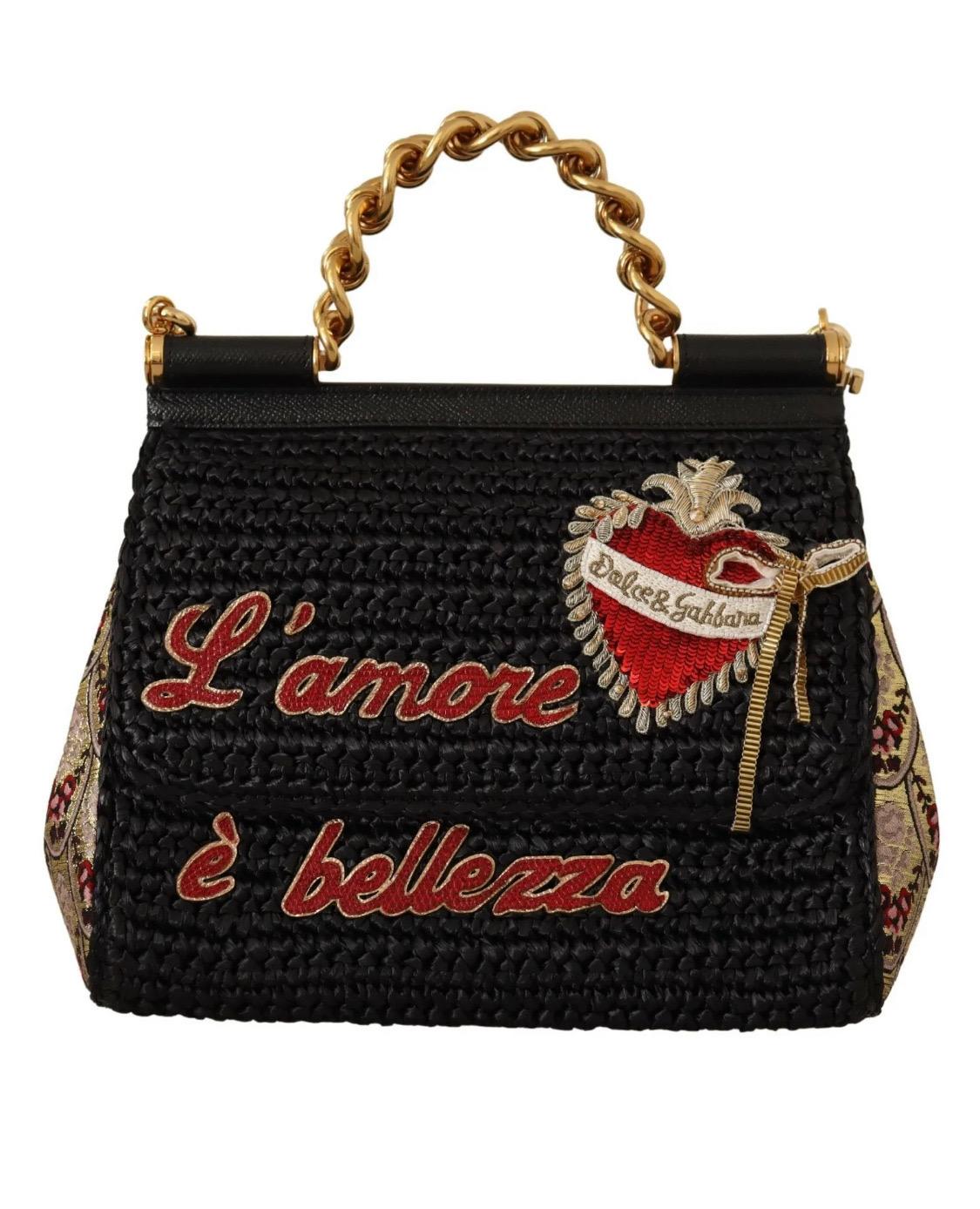 Dolce & Gabbana
Gorgeous brand new with tags, 100% Authentic Dolce & Gabbana Sicily purse bag.

Model: SICILY
Strap: One handle, adjustable and detachable shoulder strap
Color: Black, with gold metal detailing
Motive: L’amore e Bellezza
Magnetic