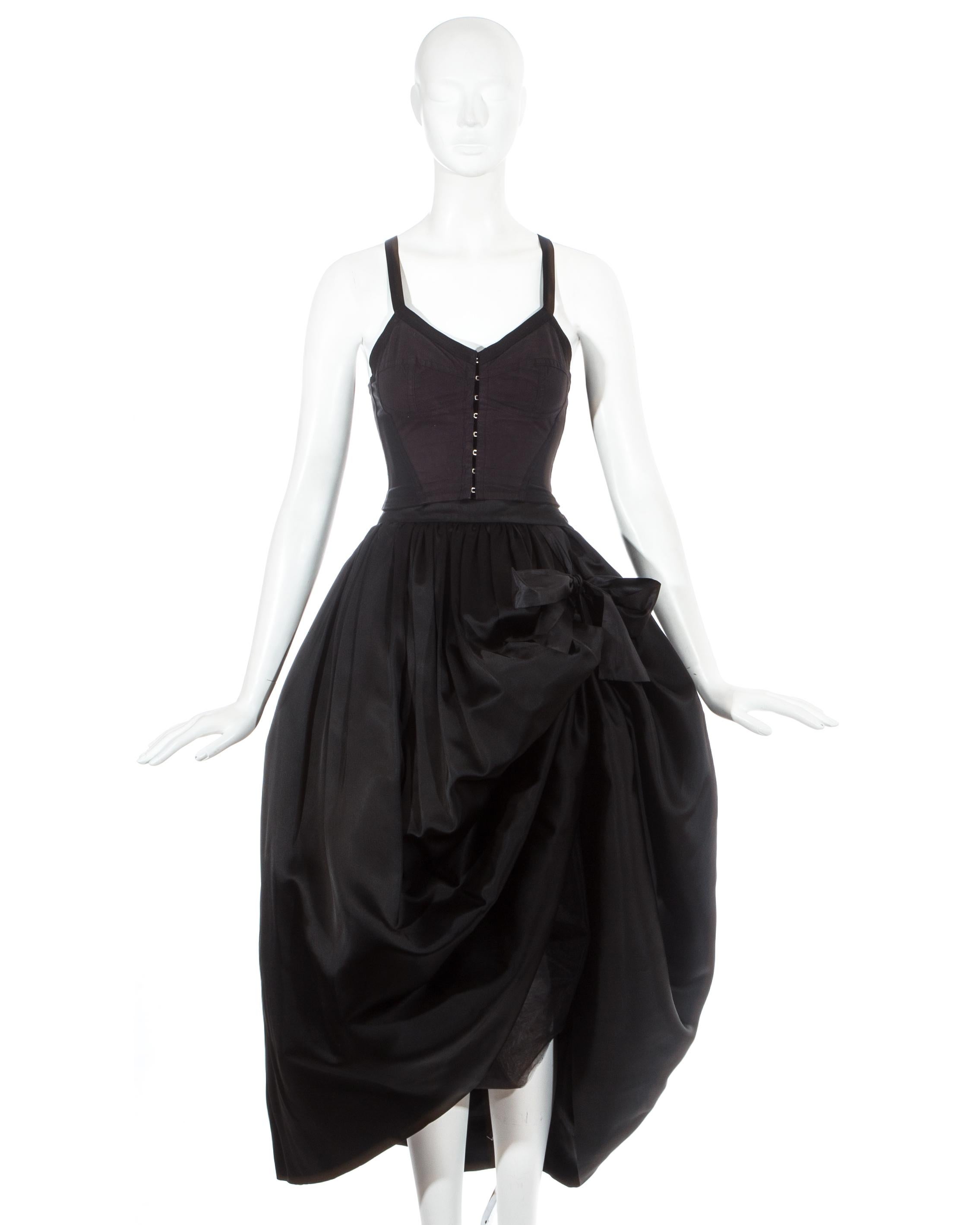 Dolce & Gabbana black silk corset and bustle skirt ensemble

Fall-Winter 1992 