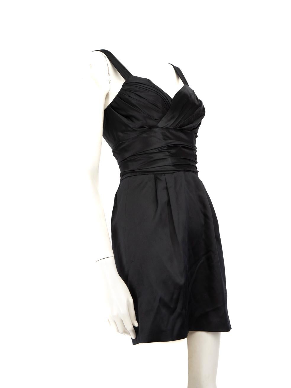 CONDITION is Very good. Minimal wear to the dress is evident. Plucks to the weave on the front above the waist and lower back left of this used Dolce & Gabbana designer resale item.

Details


Black

Silk

Mini dress

Sleeveless

Sweetheart