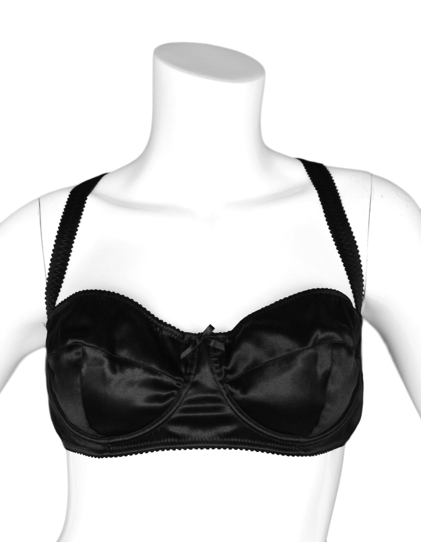 Dolce & Gabbana Black Silk/Satin Bra Sz IT5/US40
Bra only, pictured with Item #5070-1362 Dolce & Gabbana NEW Black Satin Briefs, Sz L

Made In:  Italy
Color: Black
Materials: 94% silk, 6% spandex 
Opening/Closure: Two rows of five clasps at