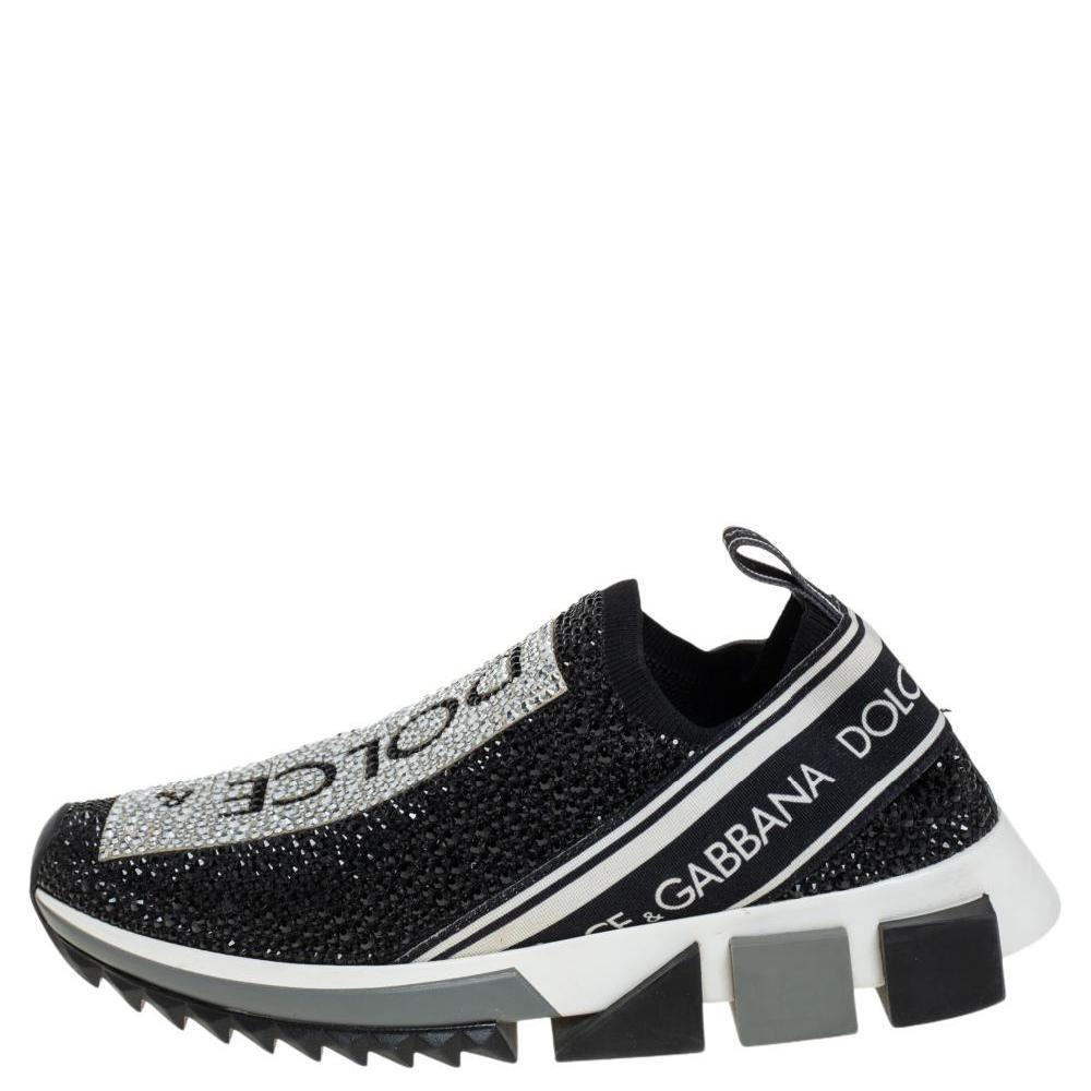 Acing the logo-mania trend and making sure your ensembles are truly striking, these Sorrento sneakers by Dolce & Gabbana are a perfect pick for the fashion-forward. Crafted from knit fabric, these sneakers are styled with bold logo detailing,