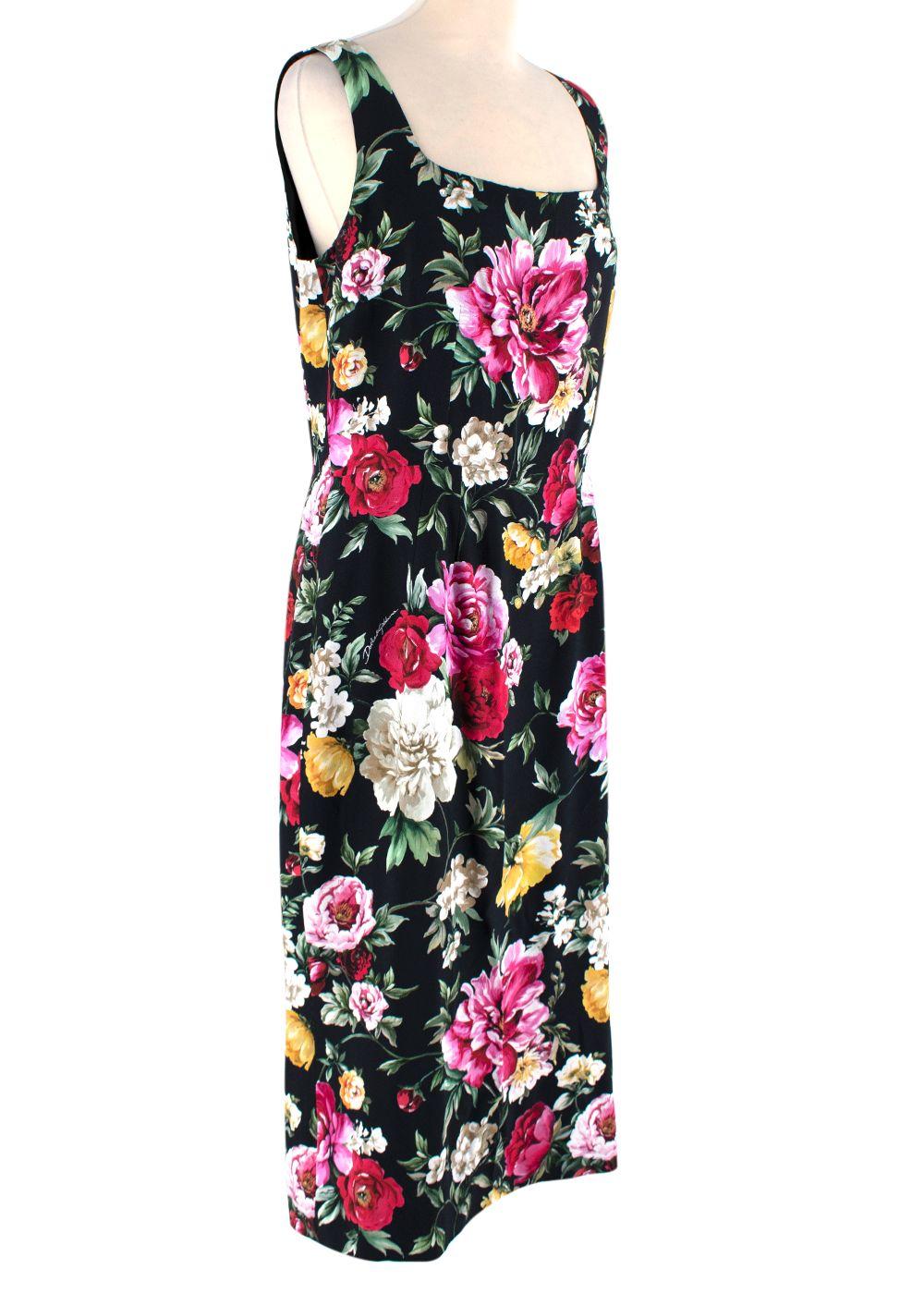 Dolce & Gabbana Black Sleeveless Floral Print Midi Dress

- Fluid, lightweight silk dress
- Bright floral printed design surrounding dress
- Scoop neckline
- Slim fitting 
- Back zip fastening with flap cover 
- Black silk lining

Materials:
94%