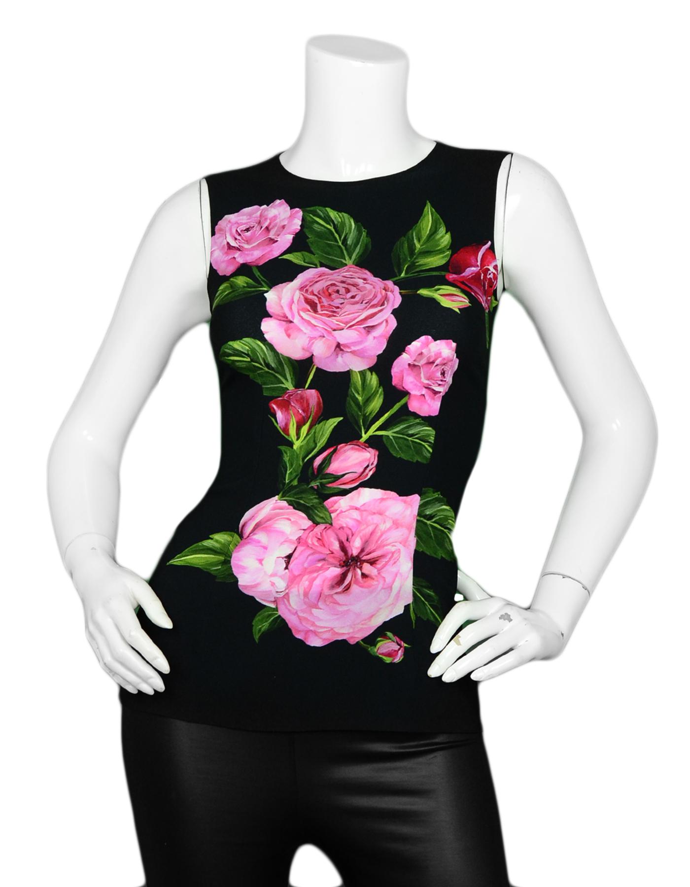 Dolce & Gabbana Black Sleeveless Top w/ Rose Print sz IT 36

Made In: Italy
Color: Black
Materials: 100% Rayon
Lining: 100% Rayon
Opening/Closure: Back zip
Overall Condition: Excellent pre-owned condition 

Tag Size: IT 36 (US 0) *Please refer to